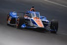Kyle Larson drives into Turn 2 during qualifying for the Indianapolis 500 auto race at Indianapolis Motor Speedway in Indianapolis, Sunday, May 19, 20
