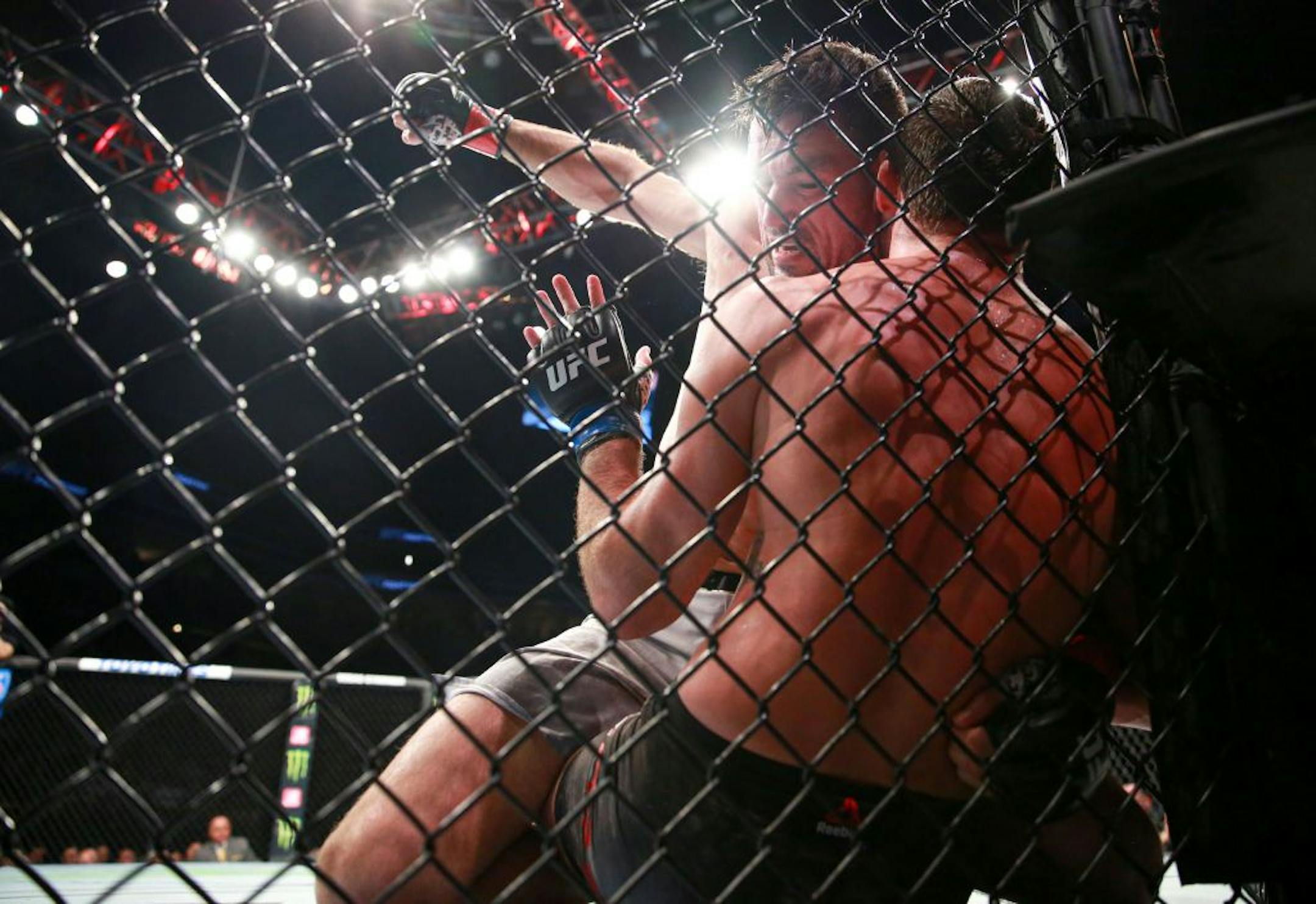 Demian Maia punches Anthony Rocco Martinwhile having him pinned to the cage during their welterweight bout. Maia would go on to win the fight by a unanimous judges decision. ALEX KORMANN ¥ alex.kormann@startribune.com UFC Fight Night was held at Target Center on Saturday June 29, 2019. Francis Ngannou and Junior Dos Santos headlined the event.