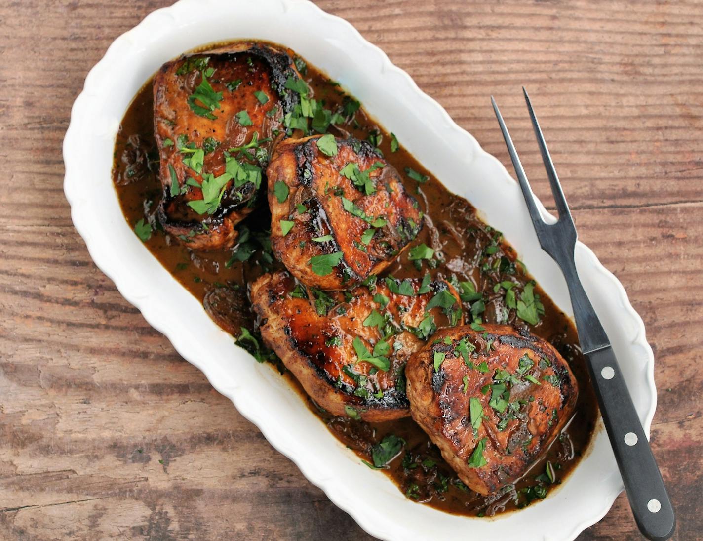 Seared Pork Chops with Cider Vinegar Pan Sauce. Credit: Meredith Deeds, Special to the Star Tribune