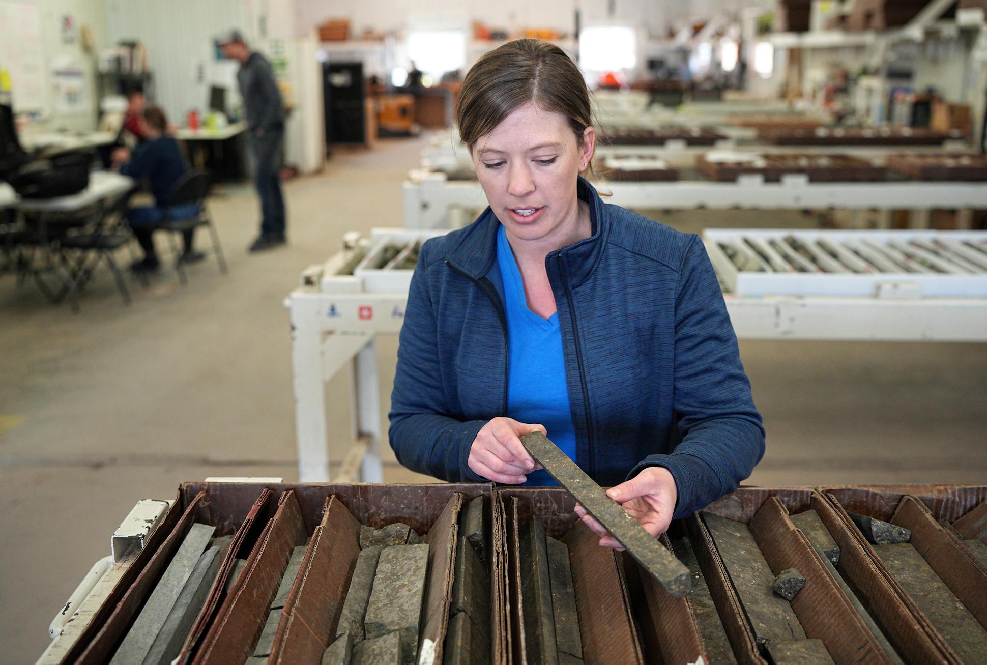 Talon Metals' Jessica Johnson examines some of the core samples taken from the proposed Tamarack Mine.