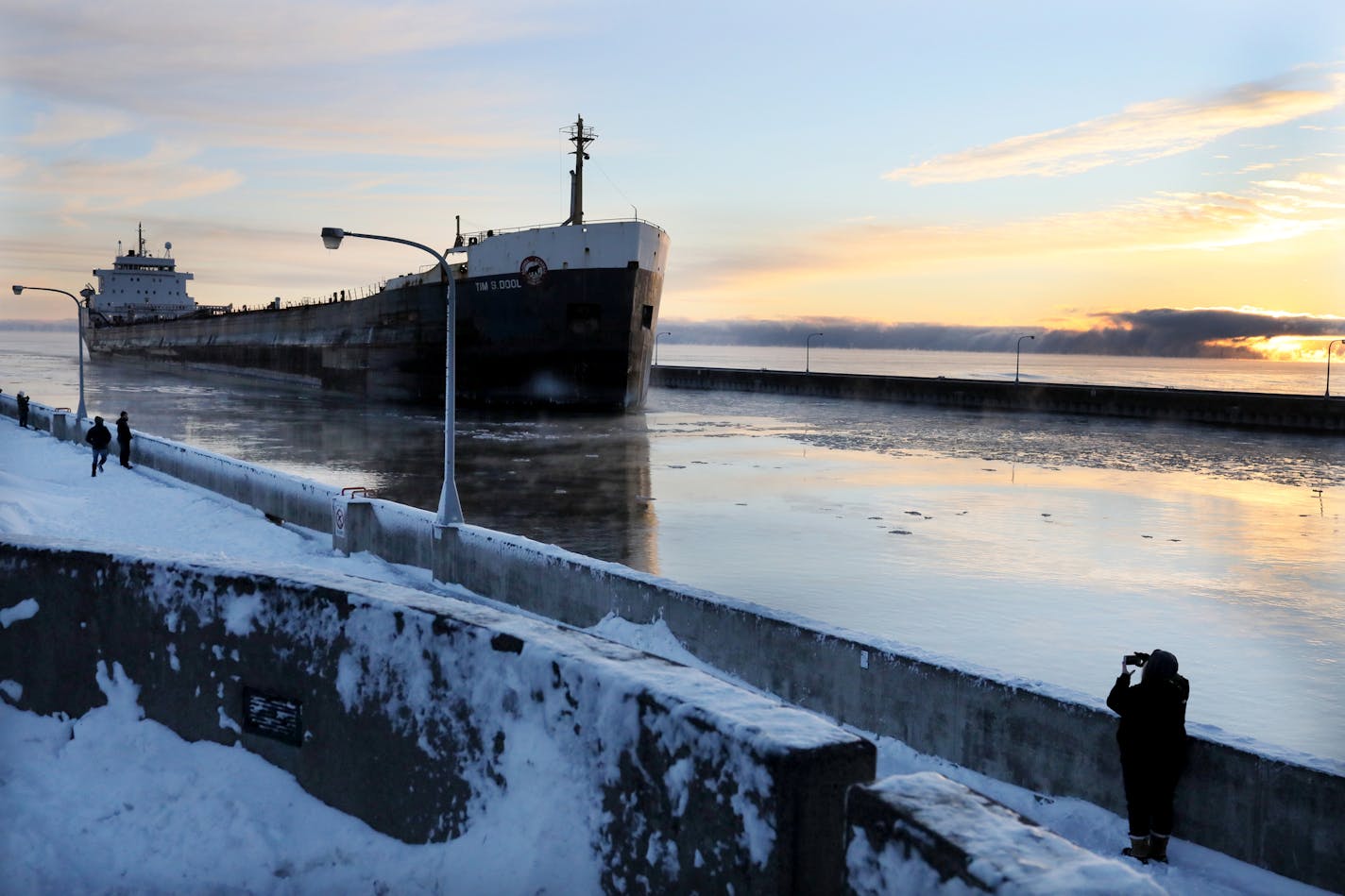 The Tim S. Dool , a 730-foot lake freighter built in 1967, was the first ship into Duluth Harbor under the new light of 2019. (DAVID JOLES/Star Tribune staff photo)