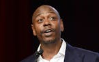 FILE - In this July 18, 2015 file photo, comedian Dave Chappelle speaks at the RUSH Philanthropic Arts Foundation's Art for Life Benefit in New York. 
