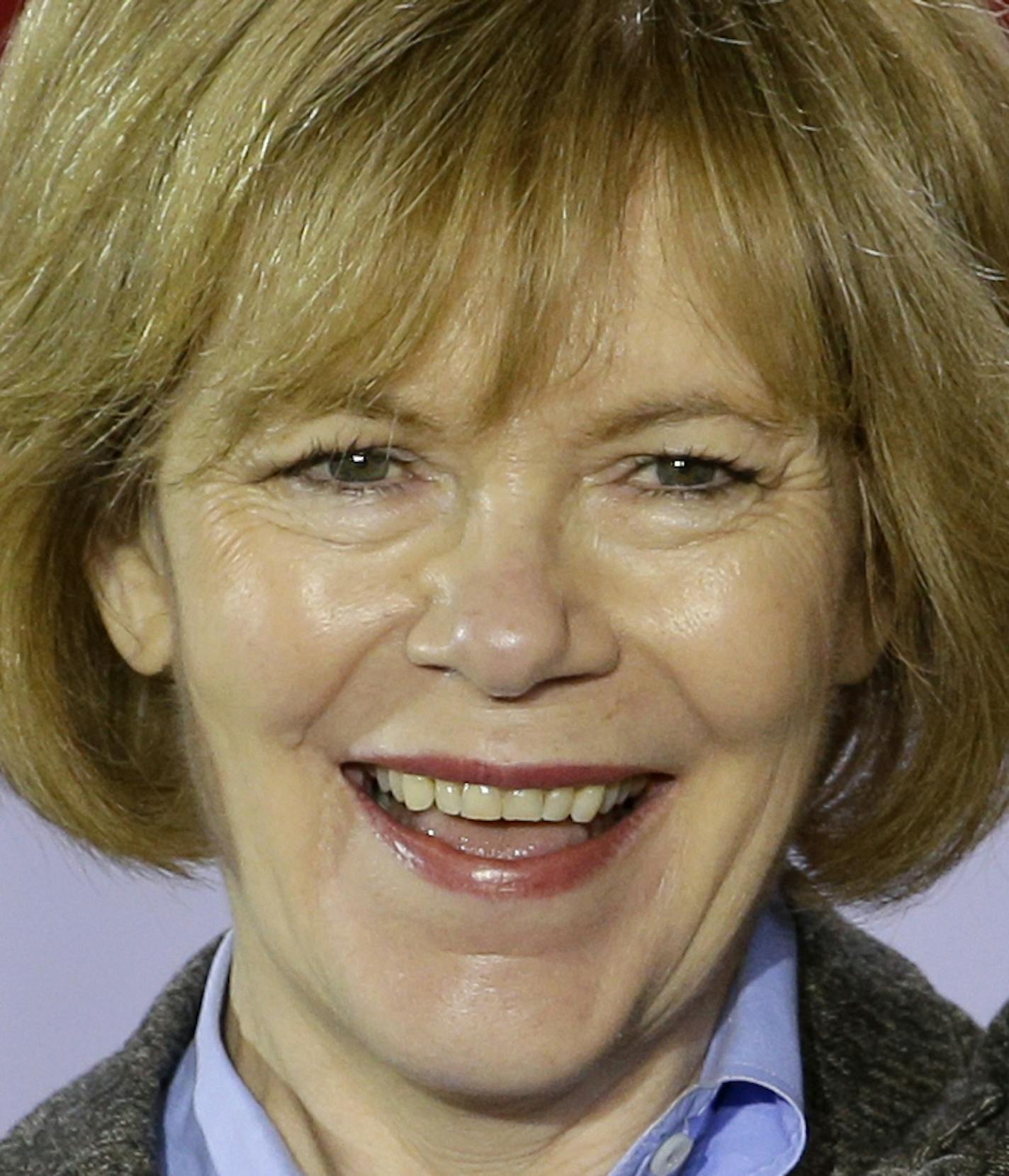 Minnesota Democratic candidate for Lt. Gov. Tina Smith appears at a get-out-the-vote rally in support for Democratic U.S. Sen. Al Franken and Minnesota Democratic Gov. Mark Dayton at Patrick Henry High School in Minneapolis, Tuesday, Oct. 21, 2014. (AP Photo/Ann Heisenfelt) ORG XMIT: OTKAH118