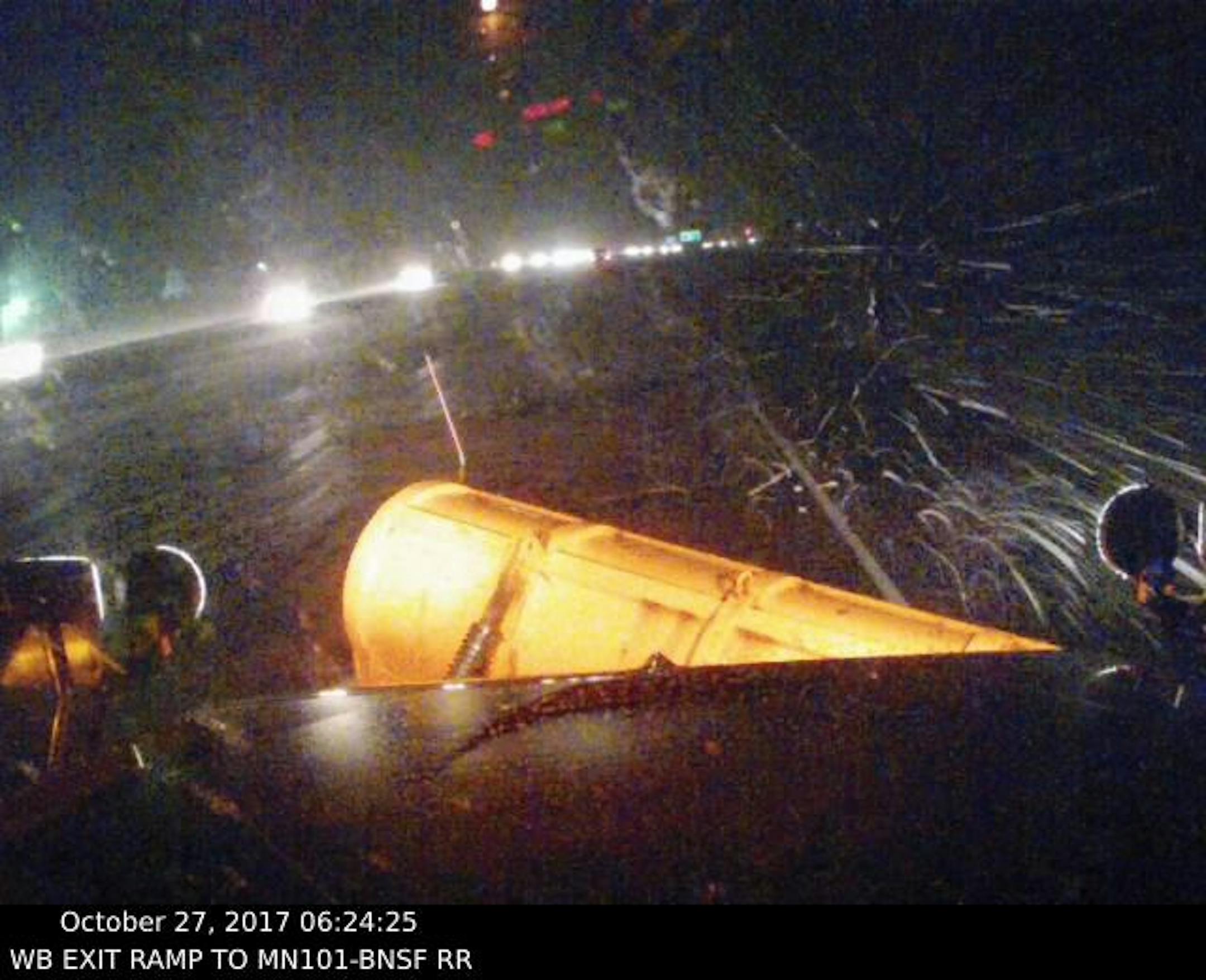 Snow was falling in parts of the metro, but roads were still only wet, as this photo taken at 6:24 a.m. by a MnDOT snow plow on Hwy. 10 near Dayton shows.