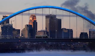 The Lowry Avenue Bridge frames a frosty skyline before dawn Wednesday, Dec. 29, 2021 in Minneapolis, Minn. ] DAVID JOLES • david.joles@startribune.c