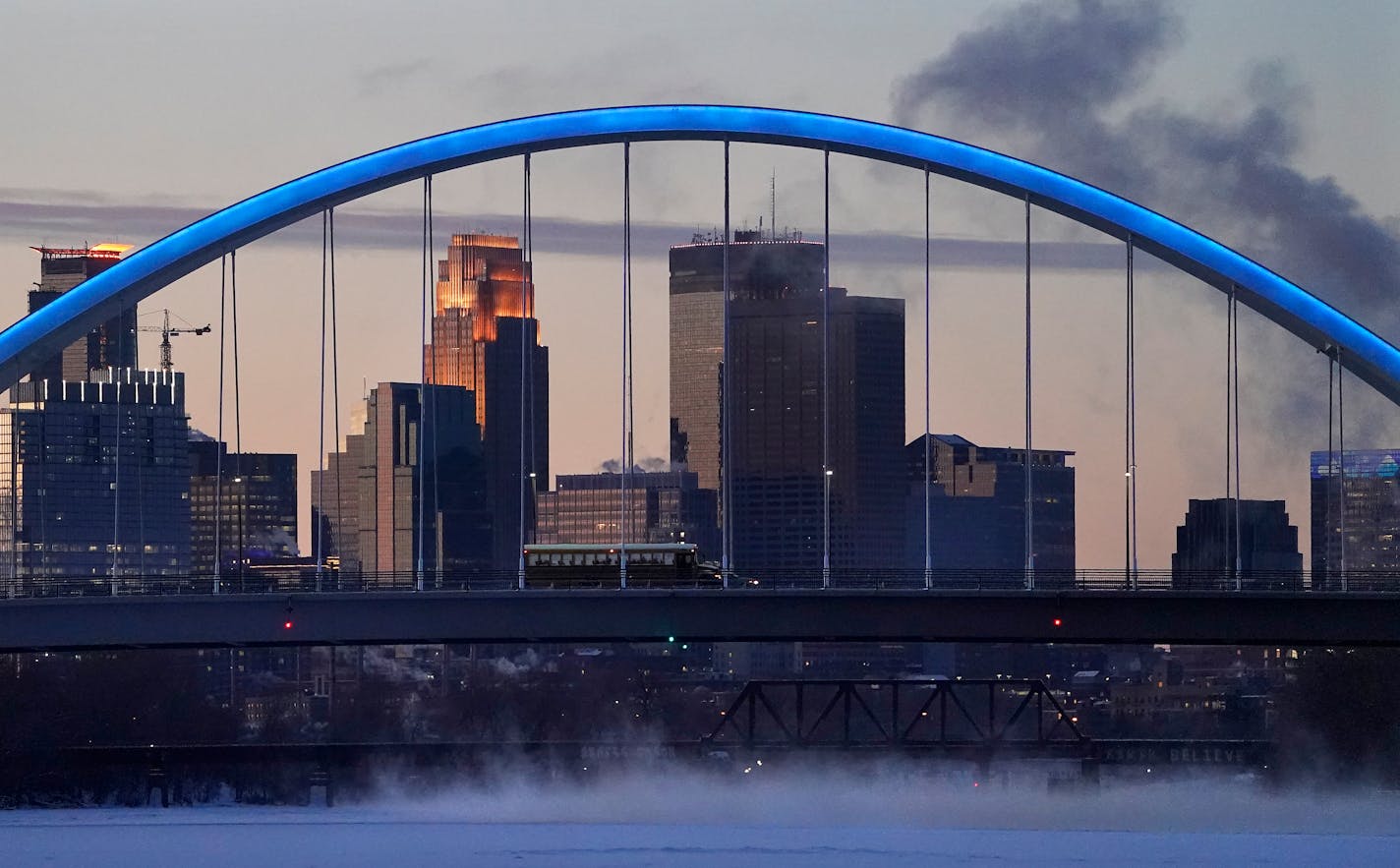 The Lowry Avenue Bridge frames a frosty skyline before dawn Wednesday, Dec. 29, 2021 in Minneapolis, Minn. ] DAVID JOLES • david.joles@startribune.com