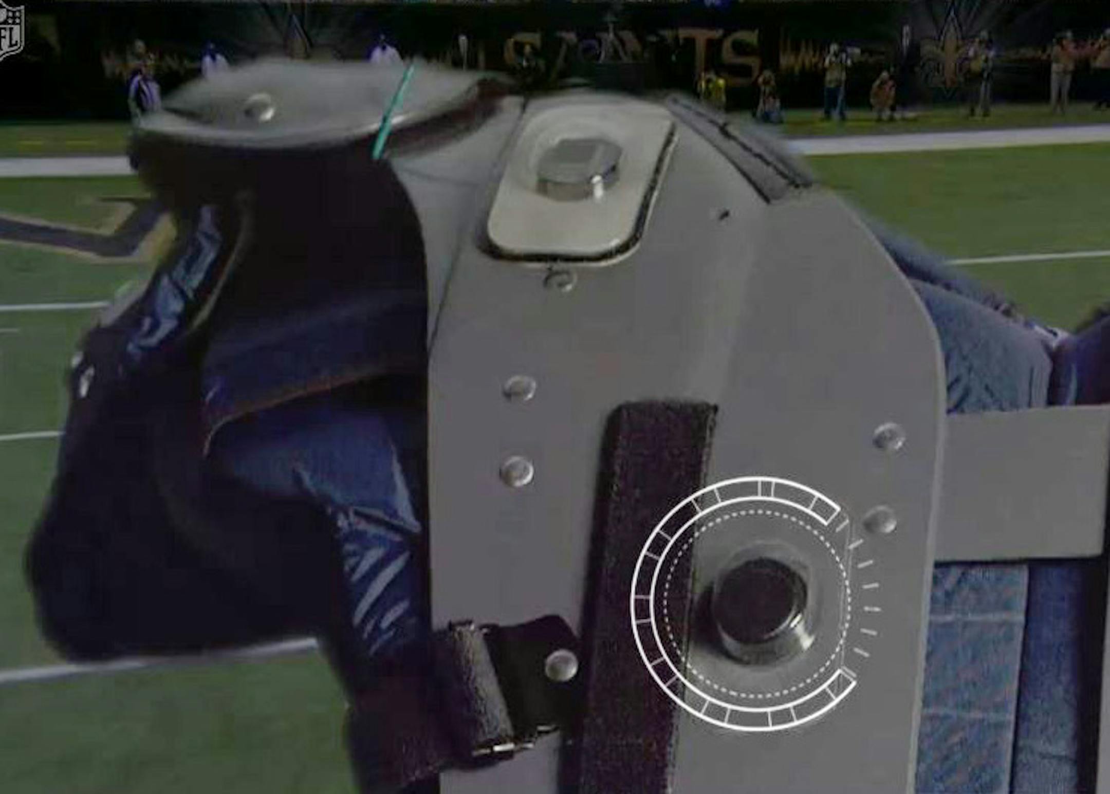 Screen grab from NFL.com Chips are built in football shoulder pads that is highlighted in the circle.