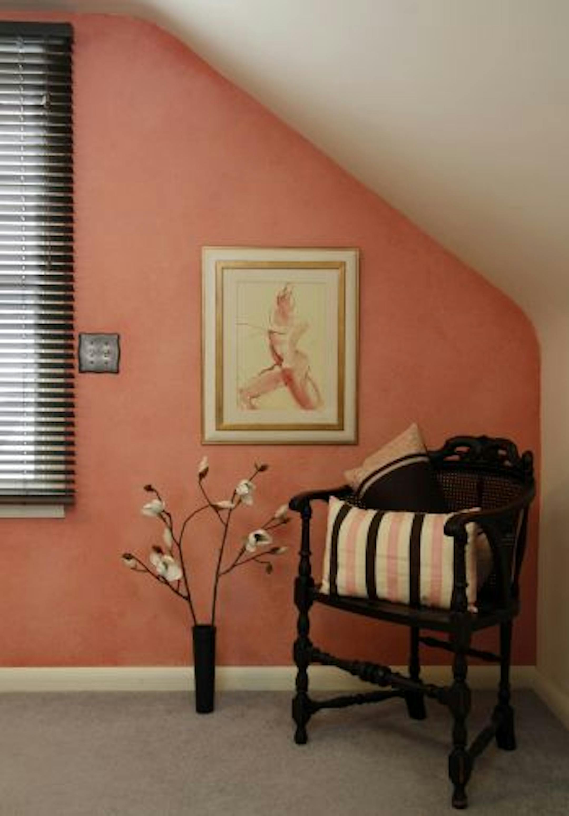 Nesting, Jayme Meyer uses bold color and large shapes in her 1950's house. Upstairs, corner.