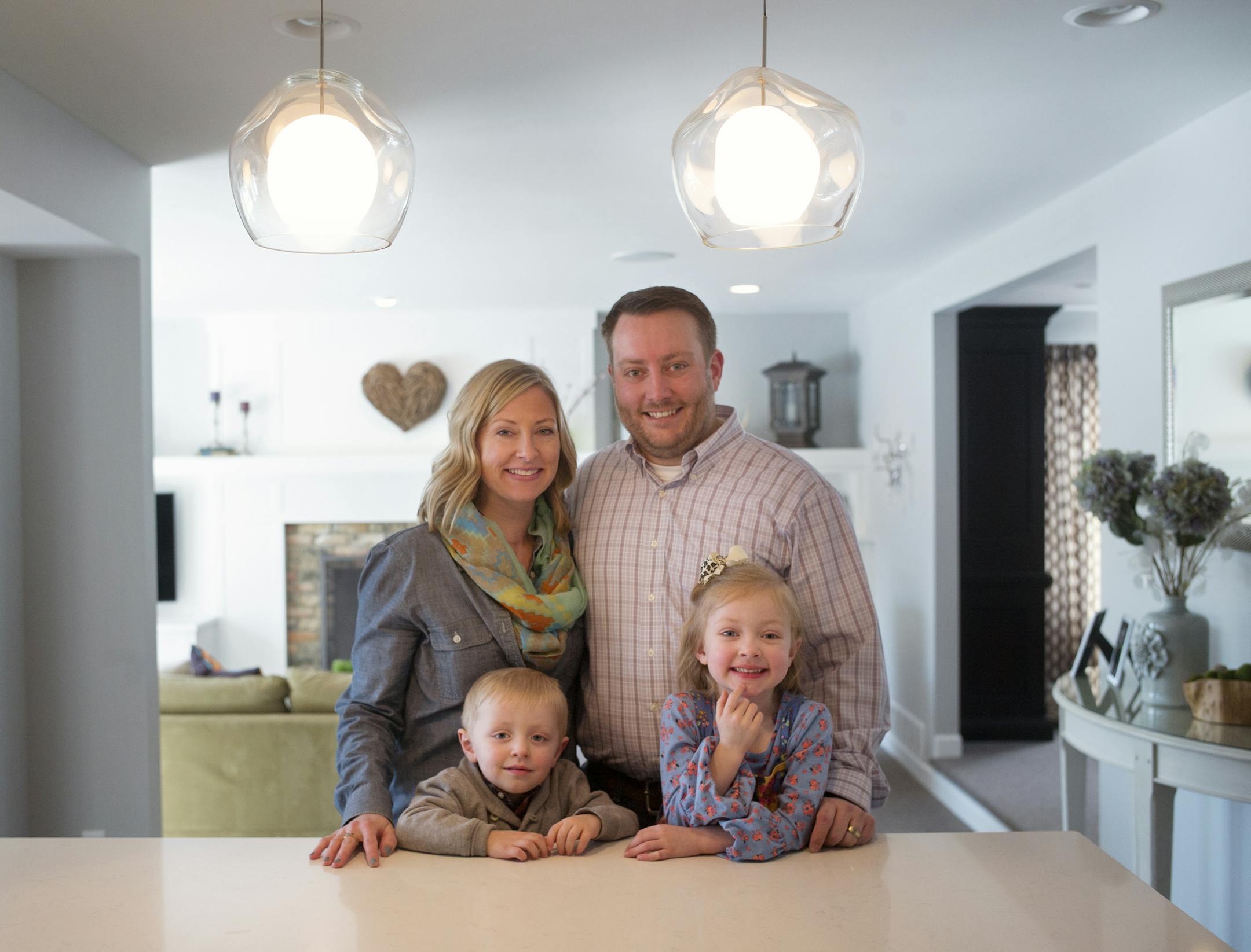 Angela and Ricky Brown show off their remodeled home, the one Ricky grew up in. The children are Adelaide,5, and Griffin,3.]Richard Tsong-Taatarii/rtsong-taatarii@startribune.com