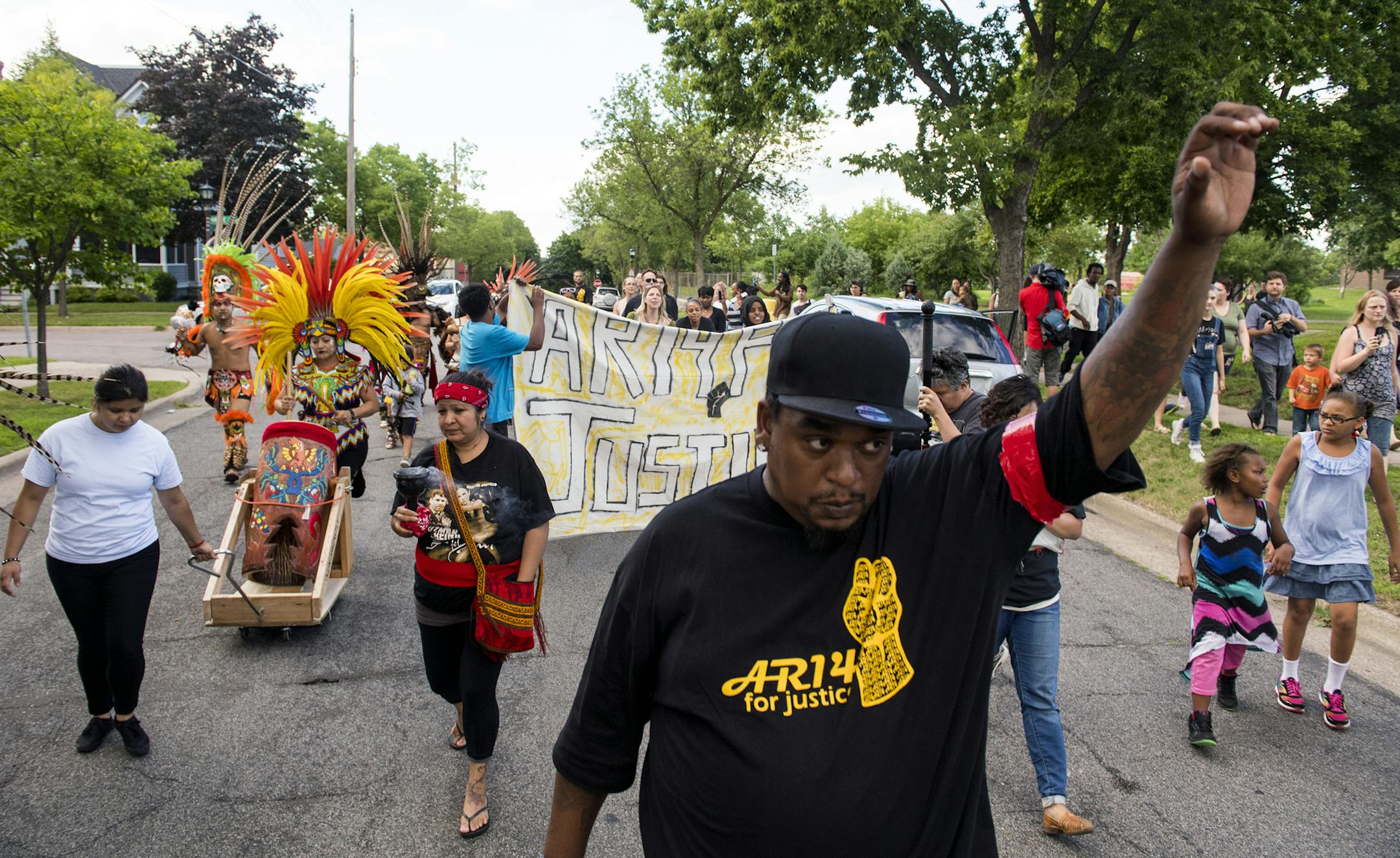 G.S. Gemini marched with demonstrators during a march organized by Awareness and Resistance 14 in St. Paul on Friday night. The march went from JJ Montessori School and eventually ended at Carty Park. Isaac Hale • isaac.hale@startribune.com