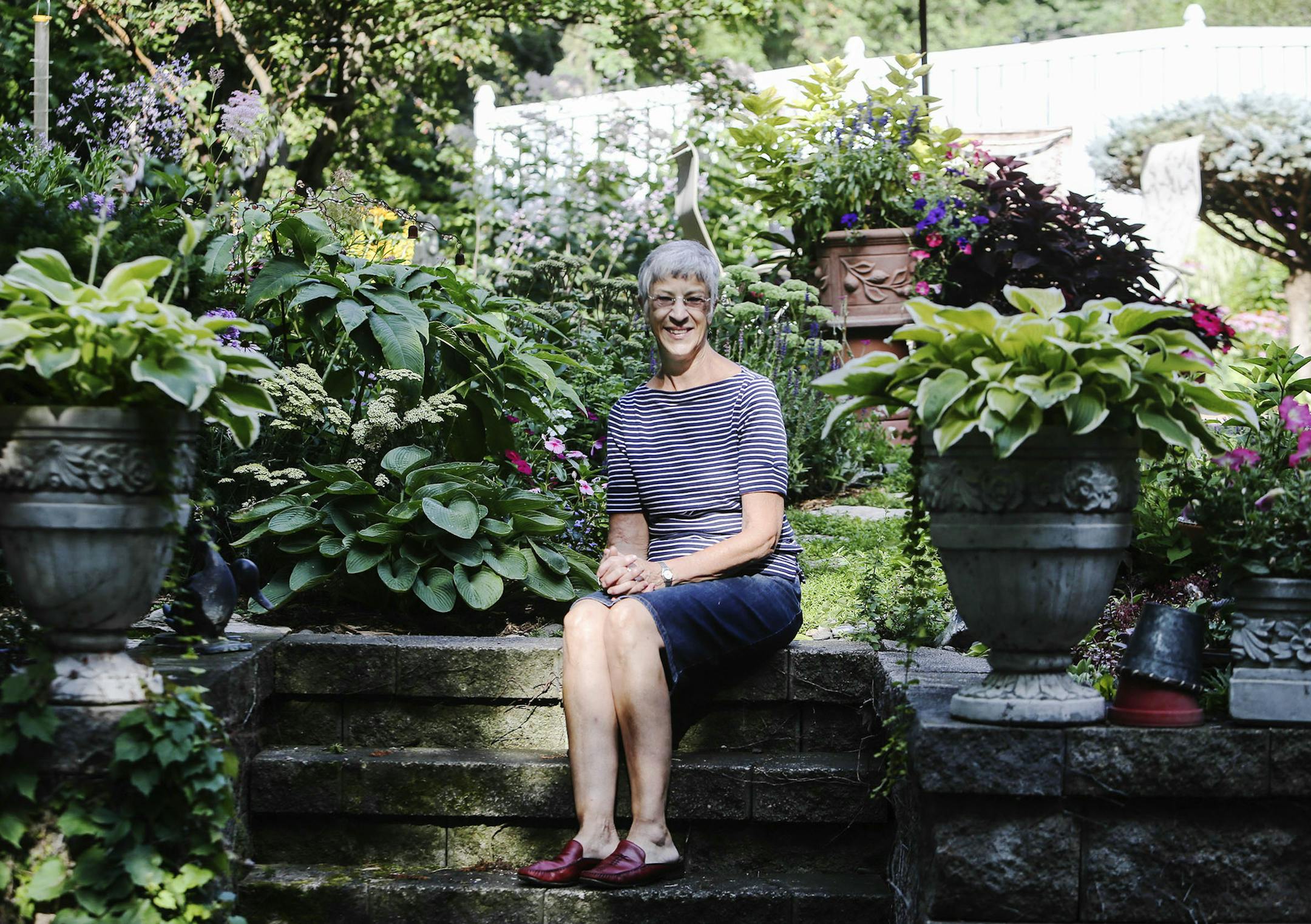 Nancy Reichert-Sisson, a self-educated gardener, has nearly two decades of experience in her Bloomington garden. “I always say that I have a different garden every year.”