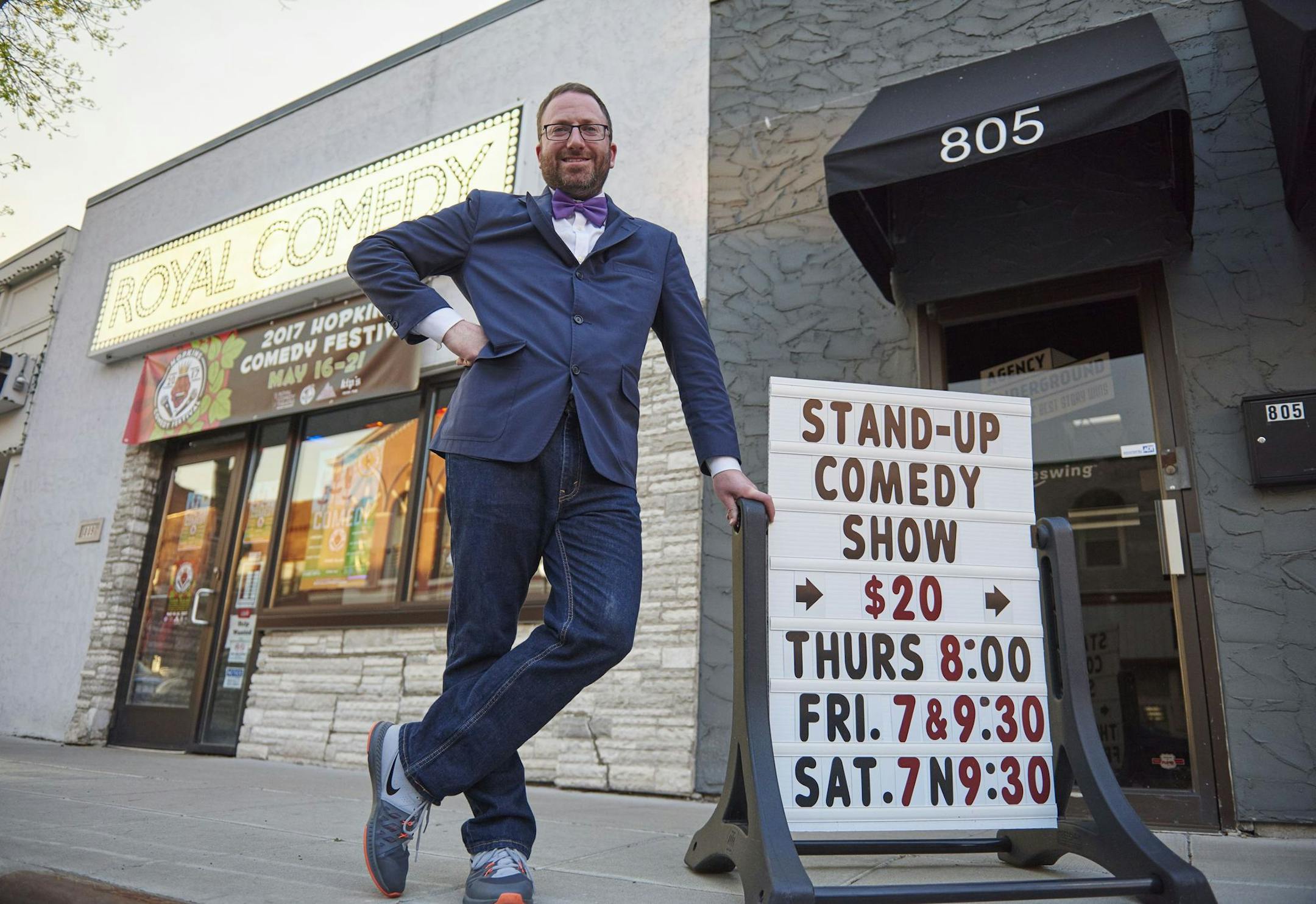 Mike Edlavitch stands outside the Royal Comedy Theatre in Mainstreet Hopkins on Saturday, May 6. Edlavitch's club recently celebrated its first anniversary.