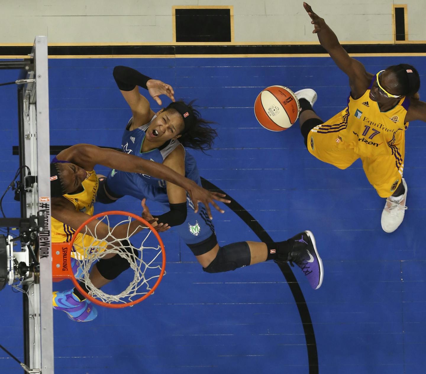 Los Angeles Sparks forward Nneka Ogwumike (30) stripped the ball from Minnesota Lynx forward Maya Moore (23) as she drove to the net in the second half at Target Center.