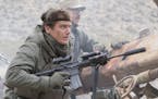 This image released by Warner Bros. Entertainment shows Michael Shannon in a scene from "12 Strong." (David James/Warner Bros. Entertainment via AP)