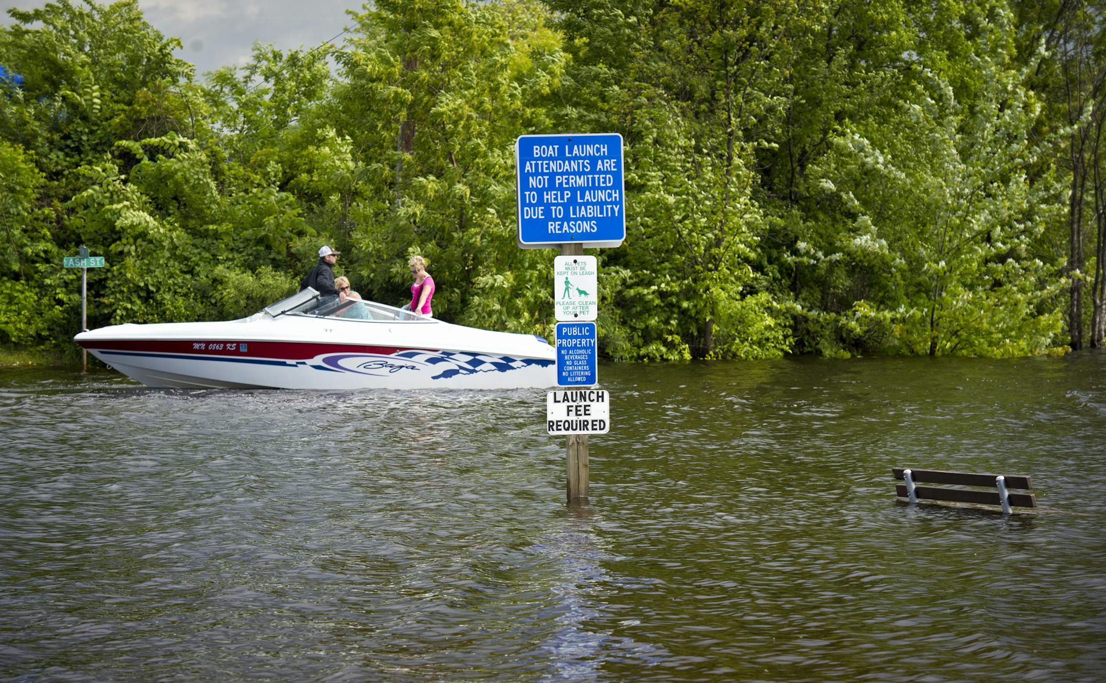 High water, a swift current and a no wake zone at the confluence of the St. Croix and Mississippi Rivers in Prescott, Wisconsin, made river boating difficult Friday, June 28, 2013 as Mark Stickler of Woodbury attempted to launch his boat at Jacques Landing Park. ] GLEN STUBBE * gstubbe@startribune.com