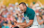 Sergio Garcia celebrated after making his birdie putt on the 18th green to win the Masters in a playoff with Justin Rose on Sunday.