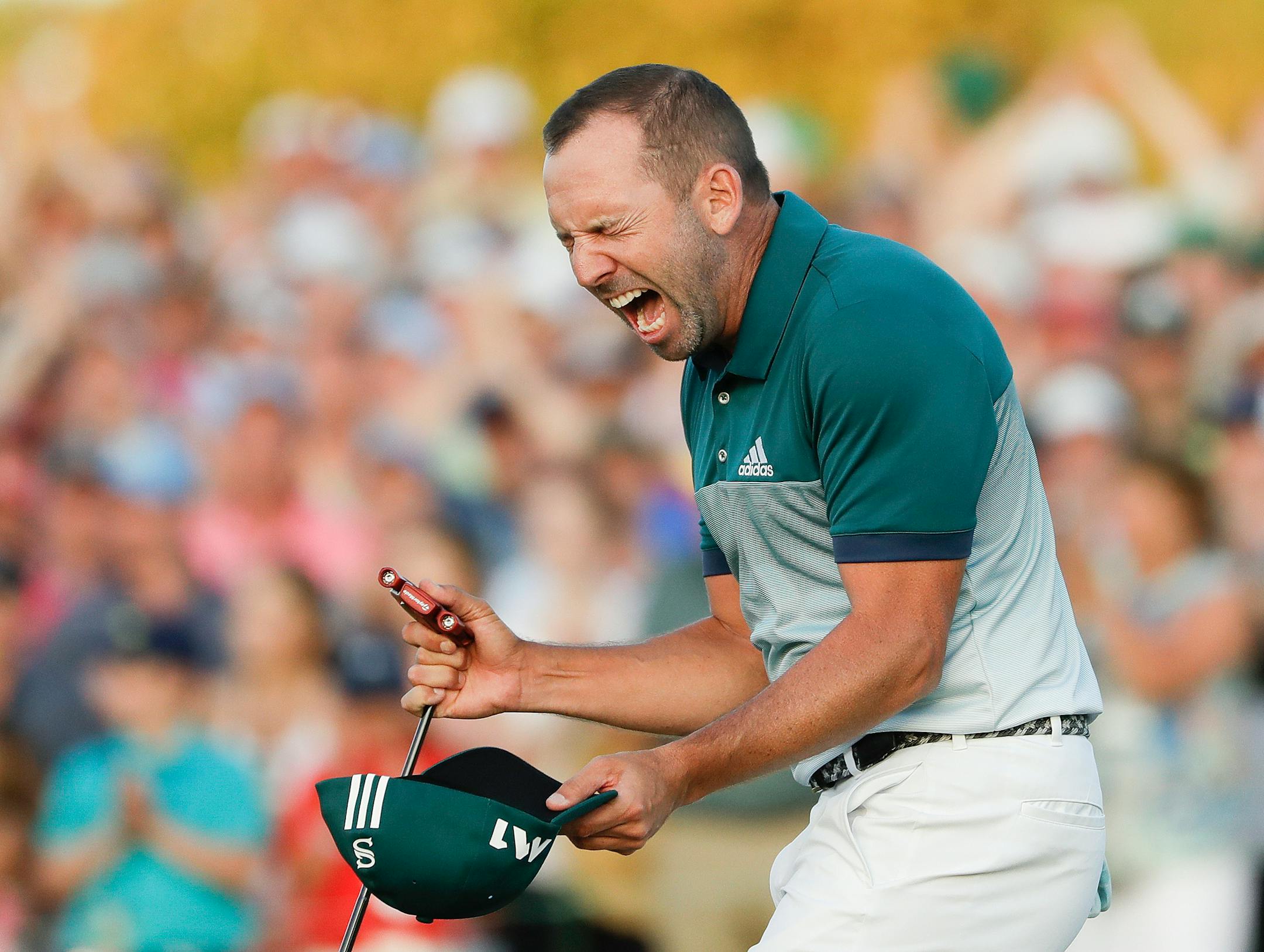 Sergio Garcia celebrated after making his birdie putt on the 18th green to win the Masters in a playoff with Justin Rose on Sunday.