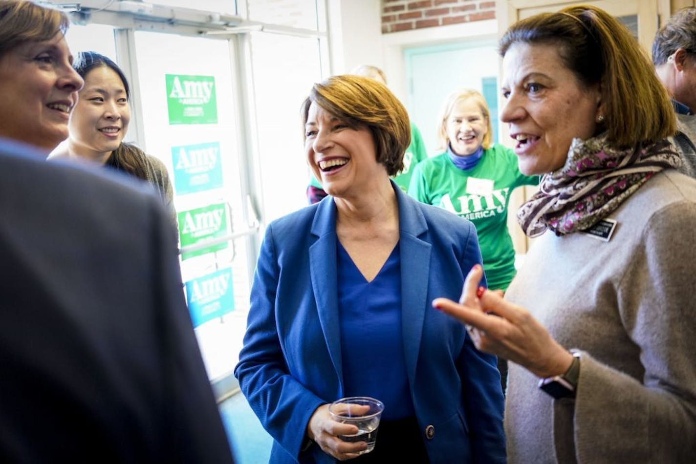 Sen. Amy Klobuchar (D-Minn.) gets ready to speak at a town hall in Rye, N.H., March 23, 2019. At events across early primary states, voters asked about health care and school shootings and immigration.