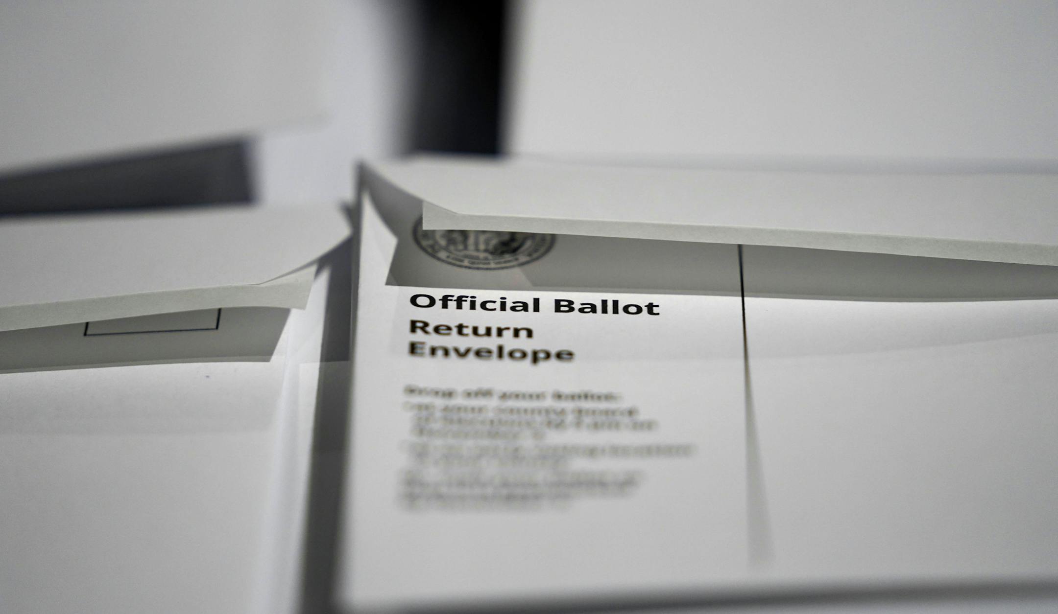 Stacks of ballot envelopes waiting to be mailed are seen at the Wake County Board of Elections in Raleigh, N.C., Thursday, Sept. 3, 2020. North Carolina is scheduled to begin sending out more than 600,000 requested absentee ballots to voters on Friday. (AP Photo/Gerry Broome)