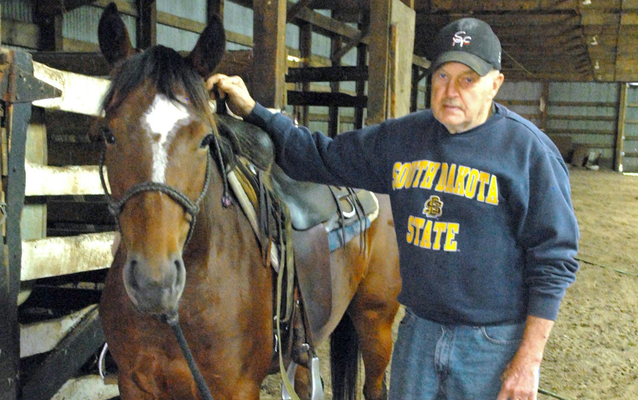 Bob McCutcheon, 83, of River Falls, Wis, still finds himself horseback every day. The longtime cutting horse and reining horse trainer polishes young horses for sale, including this 4-year-old mare.