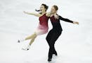 Madison Chock, left and Evan Bates of the U.S. perform during the Ice Dance final of the Grand Prix Final figure skating competition in Barcelona, Spa