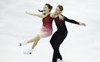 Madison Chock, left and Evan Bates of the U.S. perform during the Ice Dance final of the Grand Prix Final figure skating competition in Barcelona, Spa