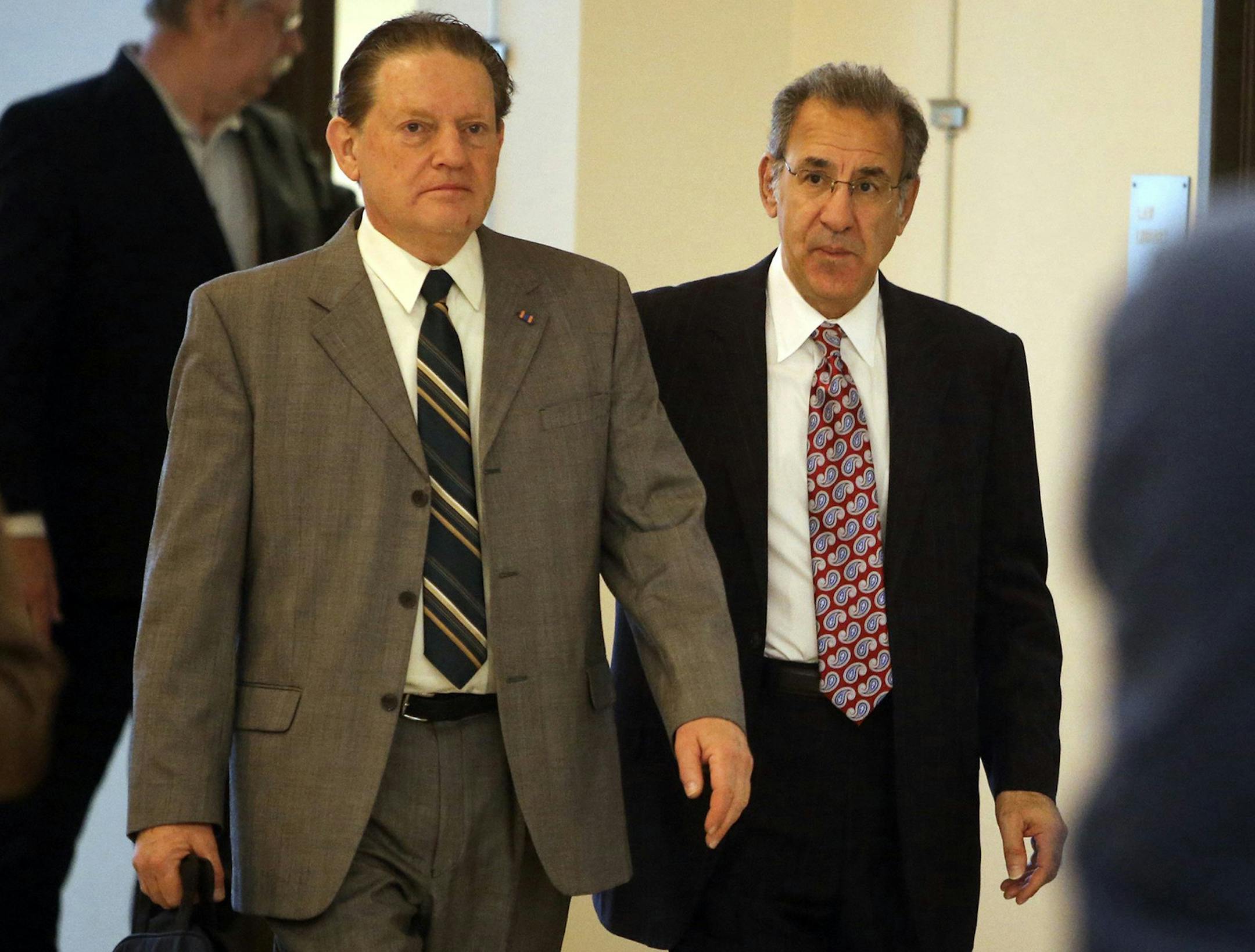 Byron Smith, left, heads into court with his lawyer, Steve Meshbesher, during the Smith's trial in the shooting deaths of 17-year-old Nick Brady and 18-year-old Haile Kifer, at the Morrison County Courthouse in Little Falls, Minn., on Tuesday, April 29, 2014. (David Joles/Minneapolis Star Tribune/MCT) ORG XMIT: 11523321 ORG XMIT: MIN1404291657402715