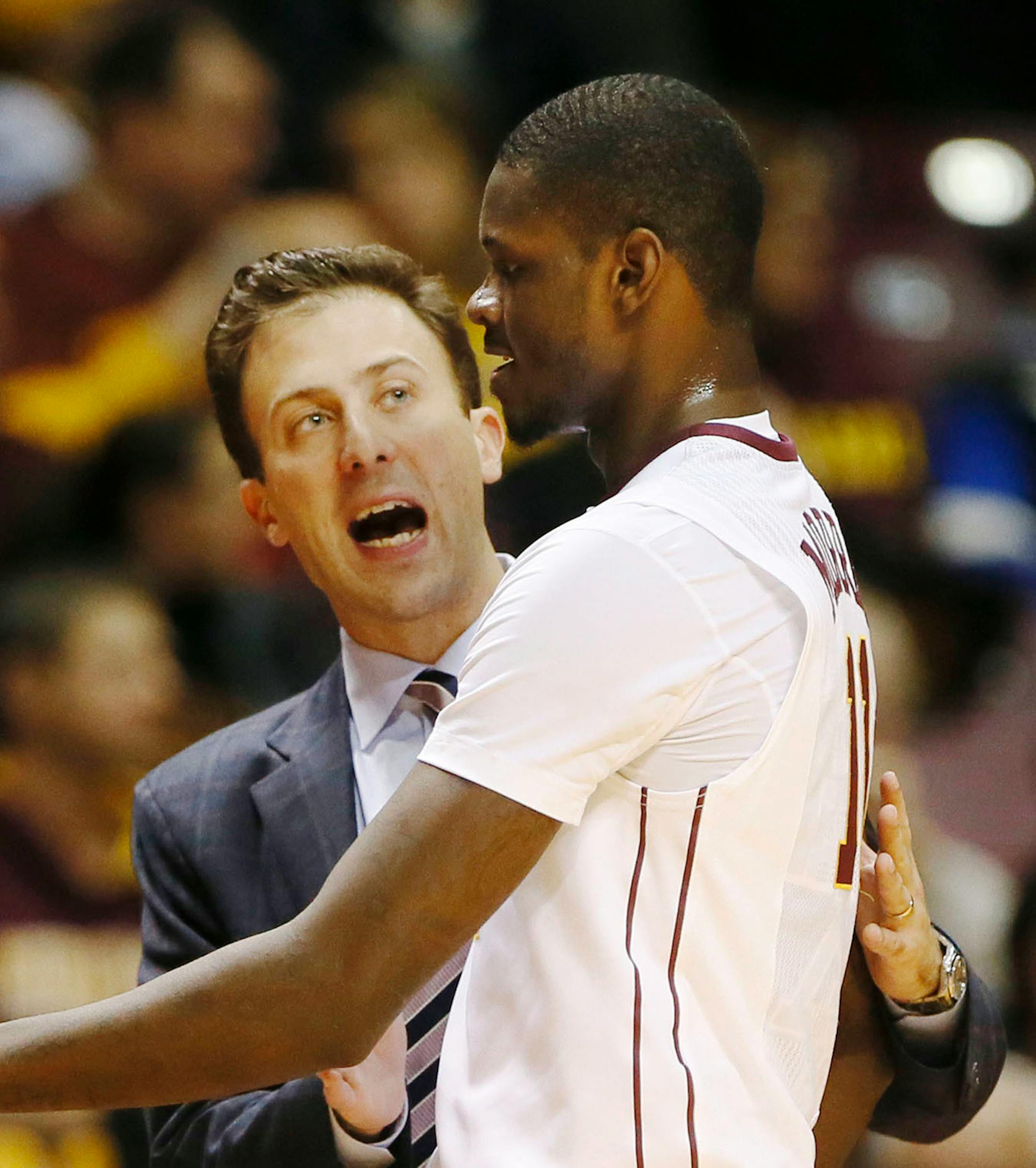 University of Minnesota coach Richard Pitino talks to Carlos Morris during a timeout against Seattle University during the first half Friday Dec. 19, 2014, at Williams Arena on the University of Minnesota campus in Minneapolis, MN.](DAVID JOLES/STARTRIBUNE)djoles@startribune.com The University of Minnesota Gophers vs. Seattle University, Friday Dec. 19, 2014, at Williams Arena on the University of Minnesota campus in Minneapolis, MN.