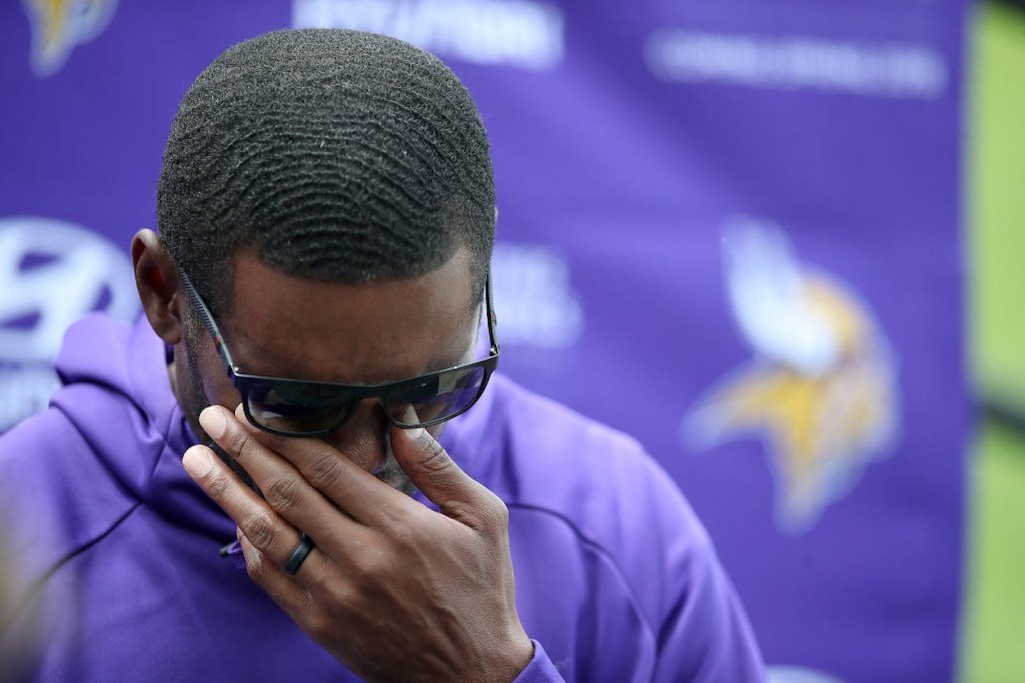 Former Minnesota Viking Randy Moss became emotional after being asked about the late coach Dennis Green during a press conference on the practice field at Winter Park, Wednesday, June 14, 2017 in Eden Prairie, MN.