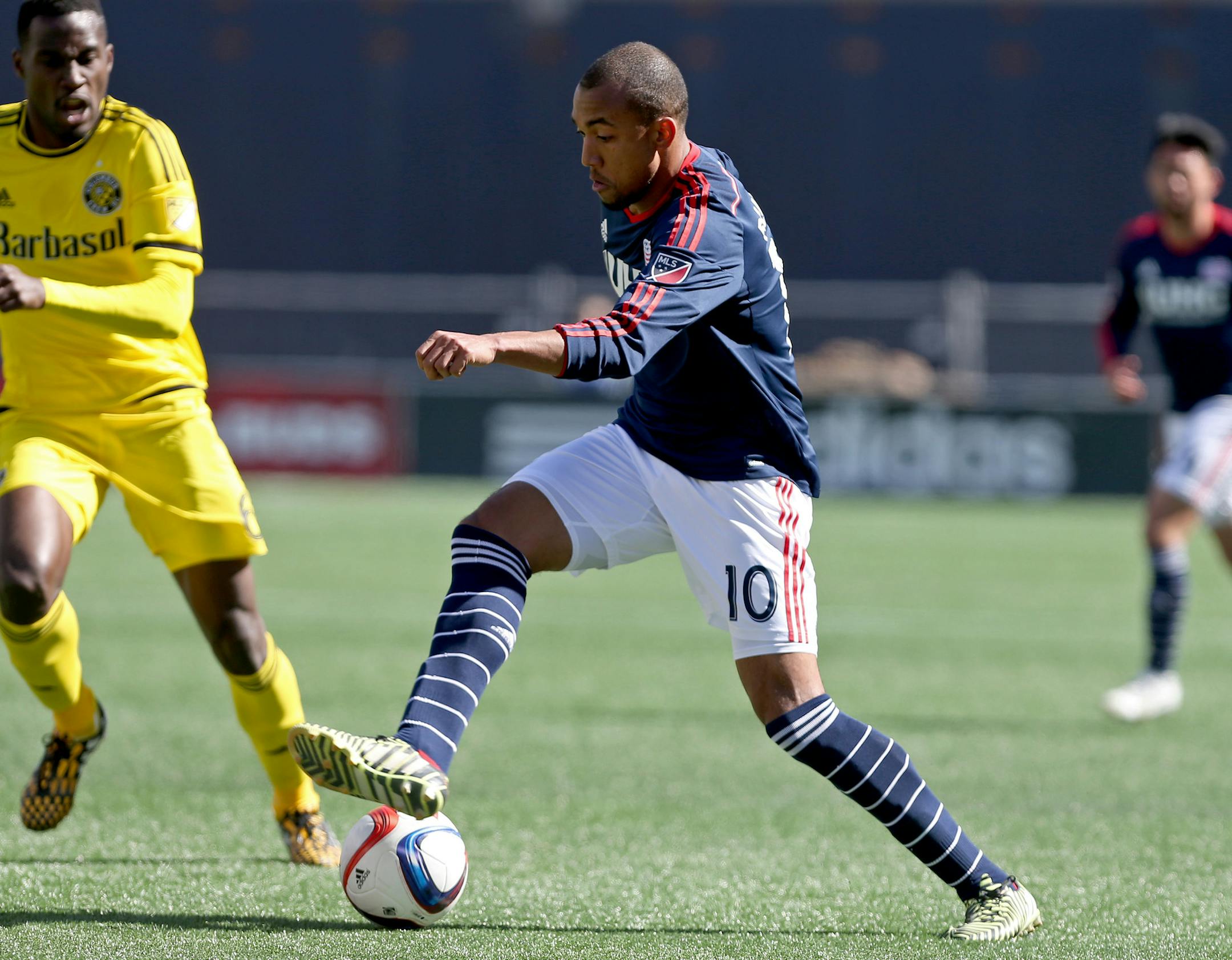 New England Revolution forward Teal Bunbury (10) dribbles the ball during the first half of a Major League Soccer game against the Columbus Crew, Saturday, April 11, 2015, in Foxborough, Mass. (AP Photo/Mary Schwalm) ORG XMIT: OTK111