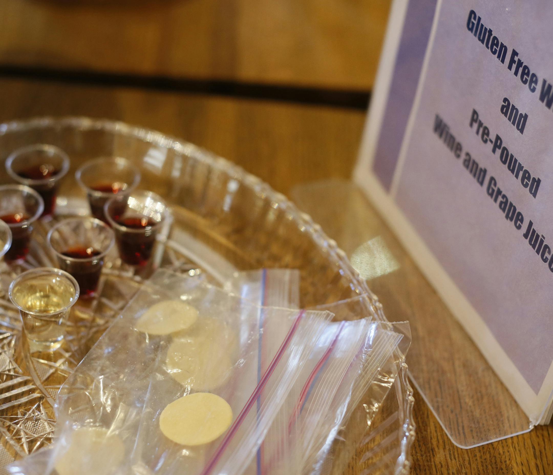 Parishioners at St. Stephen's Church can now get a gluten-free communion wafer Sunday November 16, 2014. Bloomington, Minnesota.] Jerry Holt Jerry.holt@startribune.com