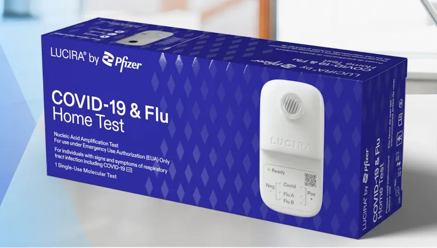 Package of LUCIRA® by Pfizer COVID-19 & Flu Home Test in blue with white writing and photo