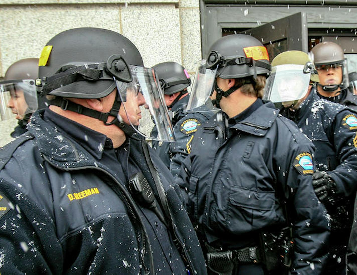 t030312 --- Clint Austin --- 121117.N.DNT.RIOTGEAR.C01 --- Duluth Police officers were riot gear during a protest by the Supreme White Alliance at City Hall in downtown Duluth in March of 2012. (Clint Austin / caustin@duluthnews.com)