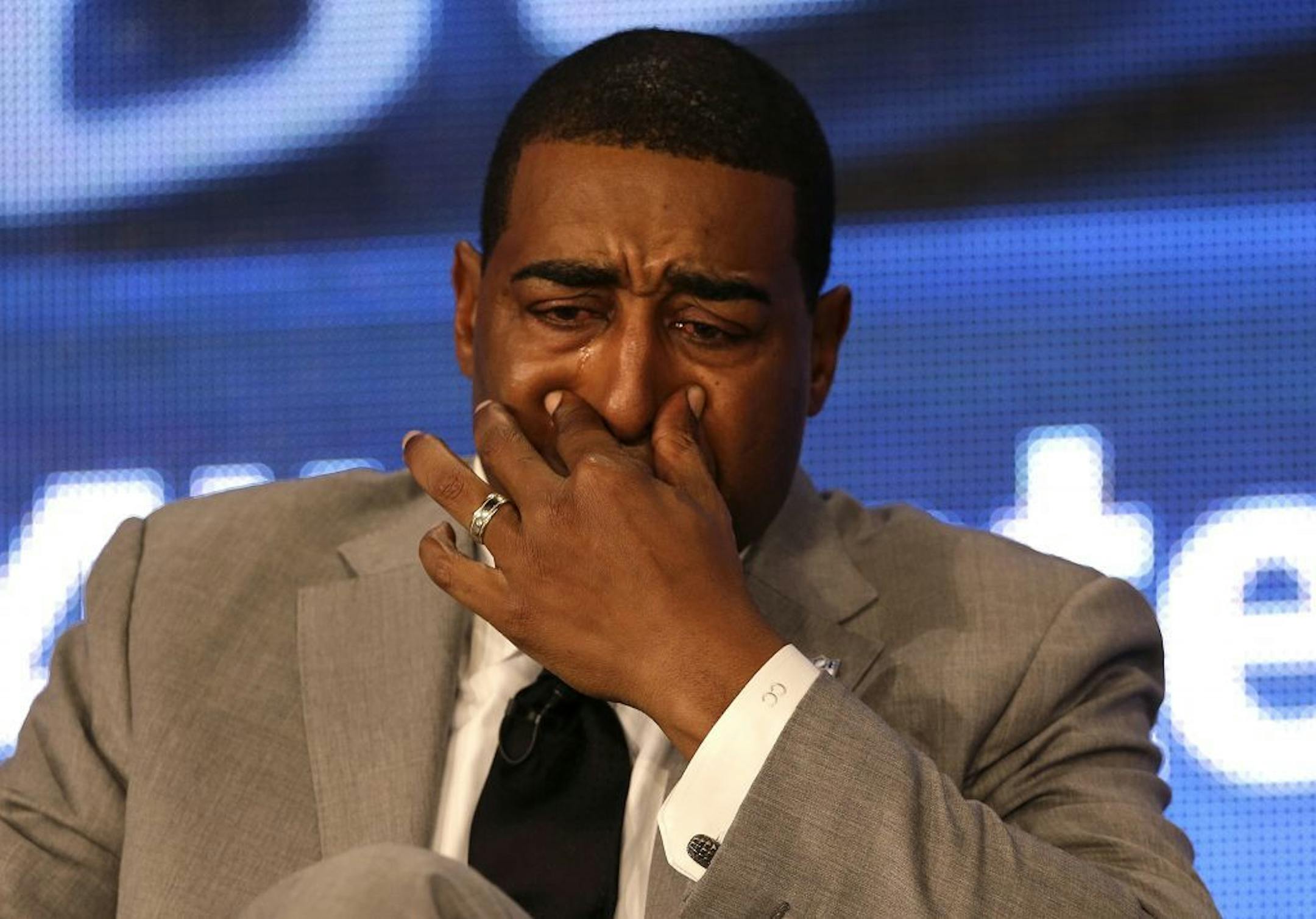 Former Minnesota Vikings wide receiver Cris Carter tears up after being selected to Pro Football Hall of Fame, Saturday, Feb. 2, 2013, in New Orleans