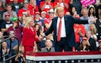 President Donald Trump acknowledged GOP candidate for Senate Karin Housley and invited her up to the stage Thursday night at Mayo Civic Center in Roch