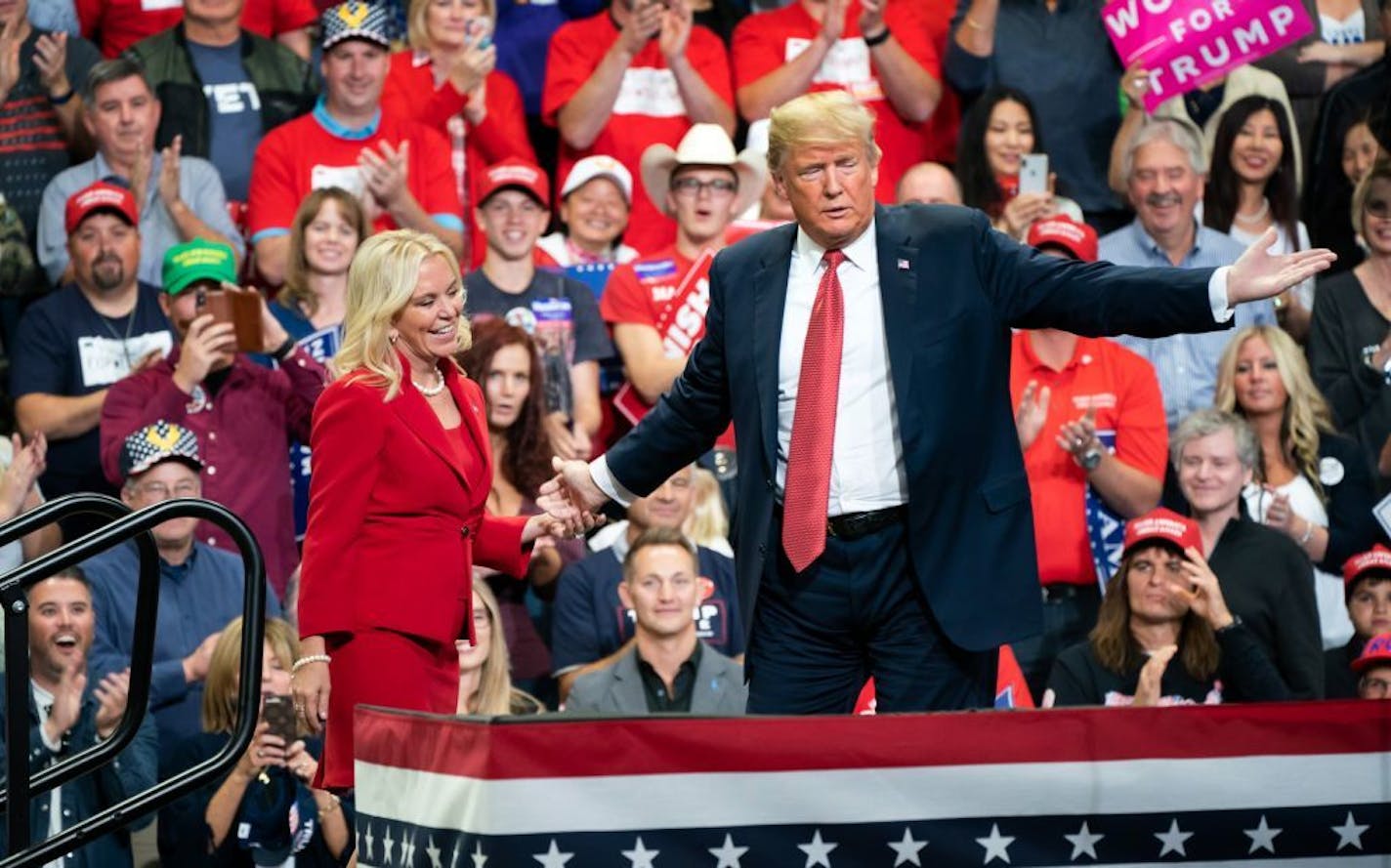 President Donald Trump acknowledged GOP candidate for Senate Karin Housley and invited her up to the stage Thursday night at Mayo Civic Center in Rochester.