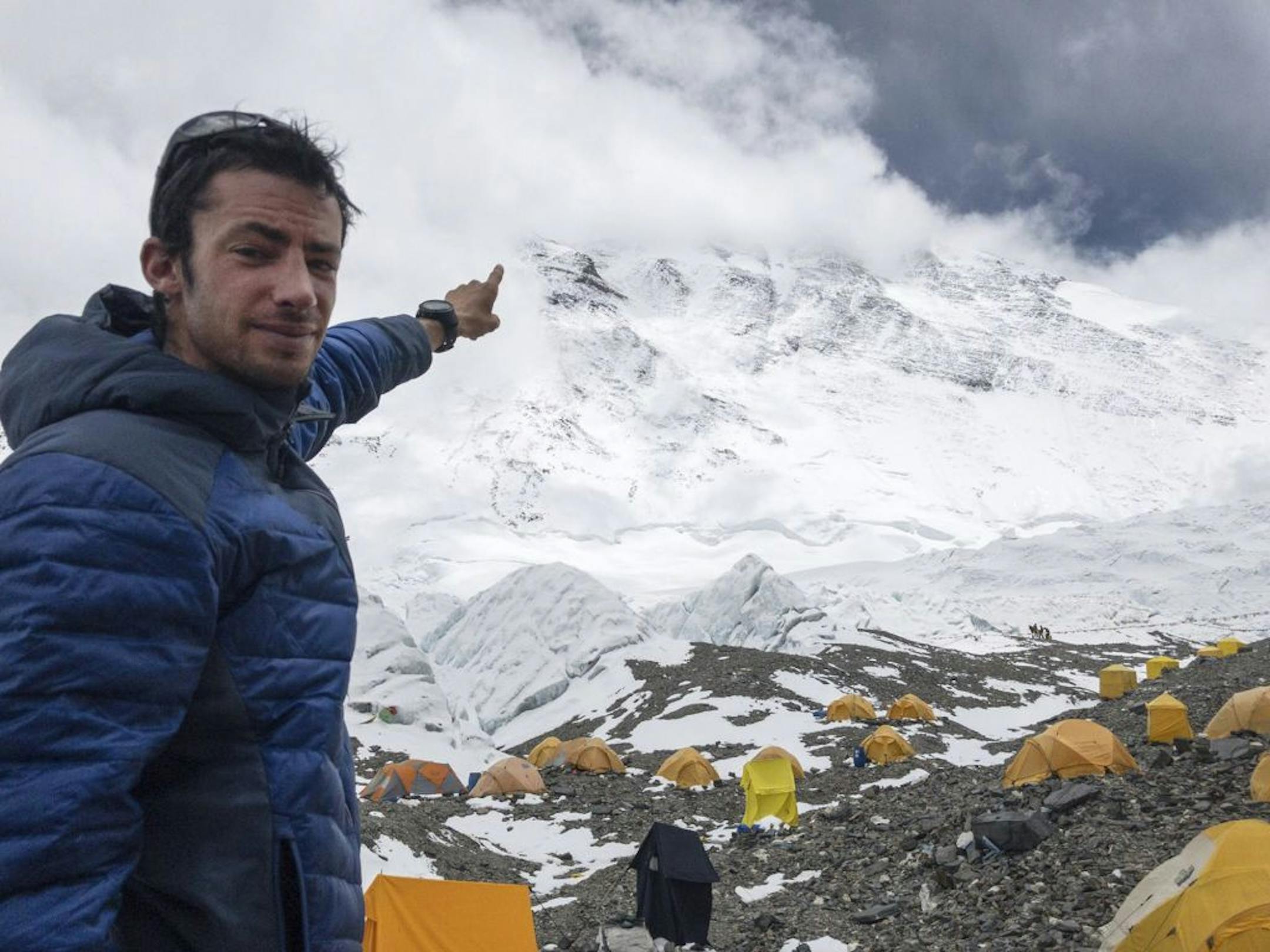 In this image released by Lymbus, Kilian Jornet from Spain points towards Mount Everest in 2017. Even the hardiest few who scale the treacherous slopes of Mount Everest cut short celebrations for some well-deserved rest. Not Kilian Jornet. He somehow still had enough legs left to scale the mountain again a few days later.