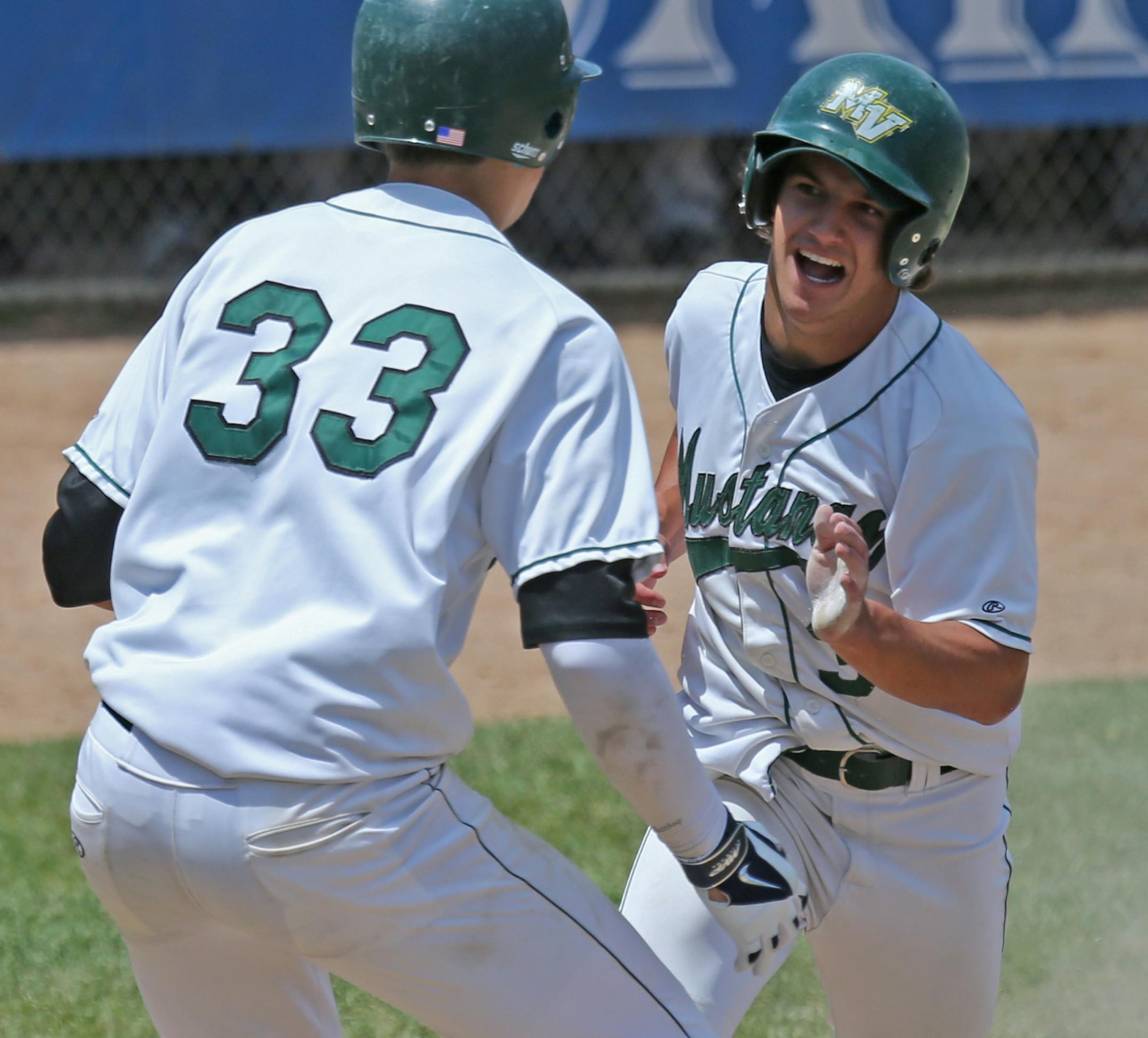(left to right) Mounds View's Tucker Gran and Joe Janey celebrated after Janey scored the winning run against Lakeville North.] Class 3A semifinals, Boys State Baseball Tournament, Midway Stadium, ST. Paul, MN., 6/13/14. Bruce Bisping/Star Tribune bbisping@startribune.com Tucker Gran, Joe Janey/roster.