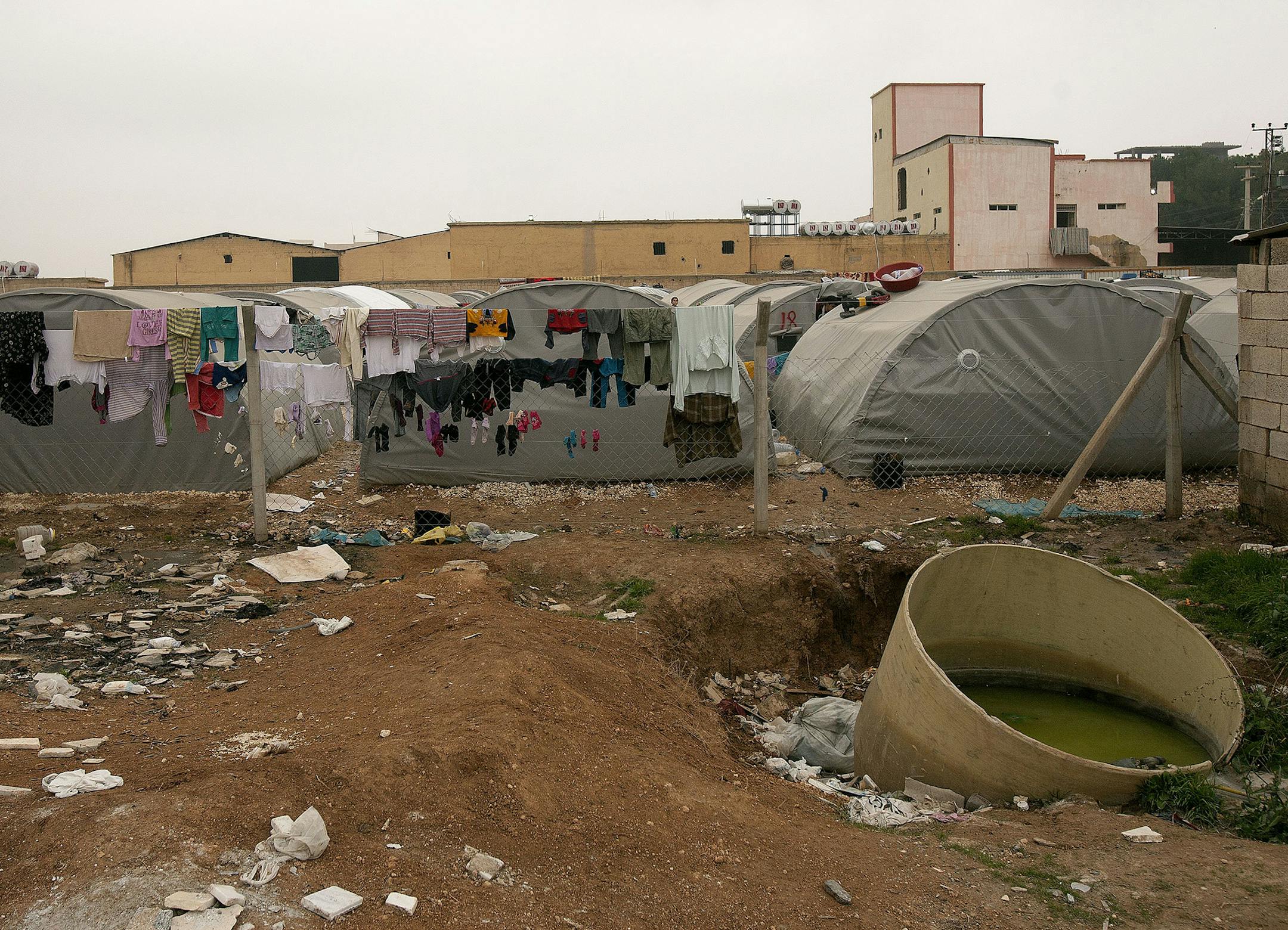 At a camp in Urfa, Turkey, at least 200,000 Kurdish refugees have fled the fighting in neighboring Kobani under the watchful eye of distrustful Turkish military units who often prevent aid from crossing the border. (Mitchell Prothero/McClatchy DC/TNS)