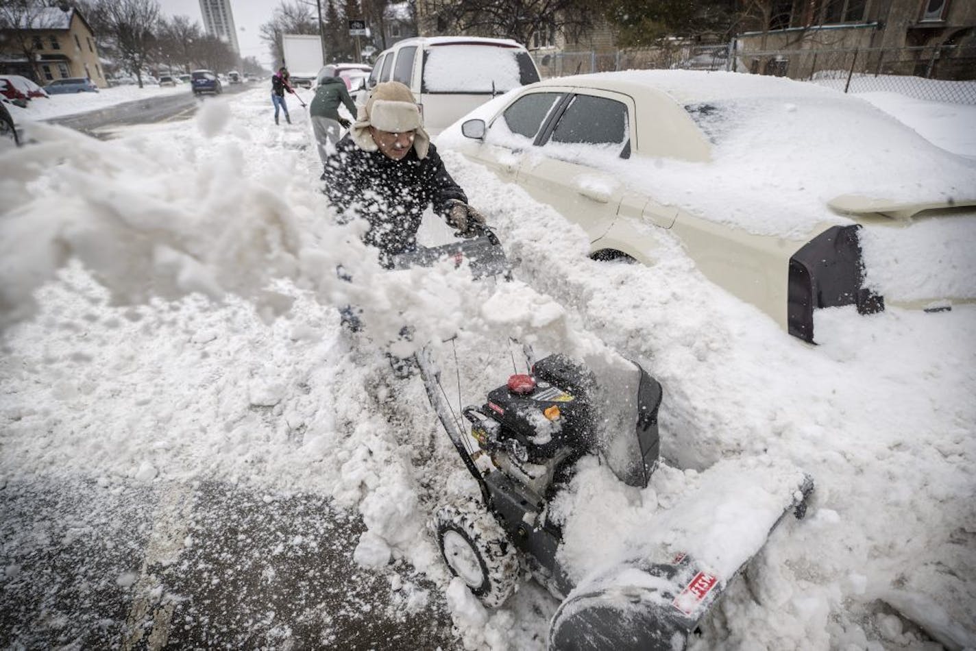 If you remember last year, when Alfonso Velez plowed around cars in the 2100 block of Portland Avenue S. in Minneapolis, you might want to put that shovel back into your car ASAP.