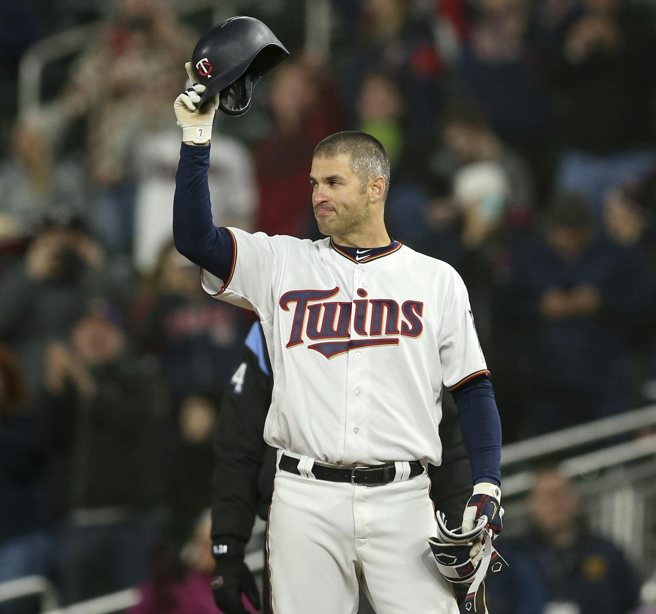 Joe Mauer tipped his helmet at first base after he got his 2000th hit with a 2 RBI grounder to center field in the seventh inning. ] JEFF WHEELER ï jeff.wheeler@startribune.com The Minnesota Twins faced the Chicago White Sox in an MLB baseball game Thursday night, April 12, 2018 at Target Field in Minneapolis.