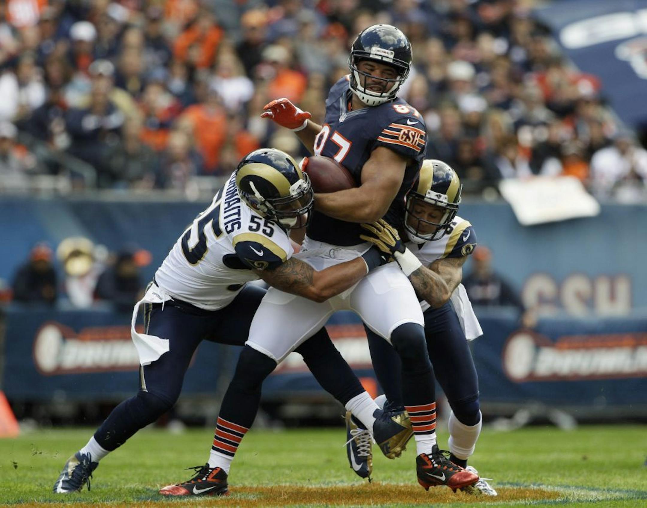 Former Wayzata and Ohio State star linebacker James Laurinaitis, now a pro standout with the Rams, tackled Bears tight end Kellen Davis back in September. Laurinaitis and the Rams face the Vikings on Sunday.