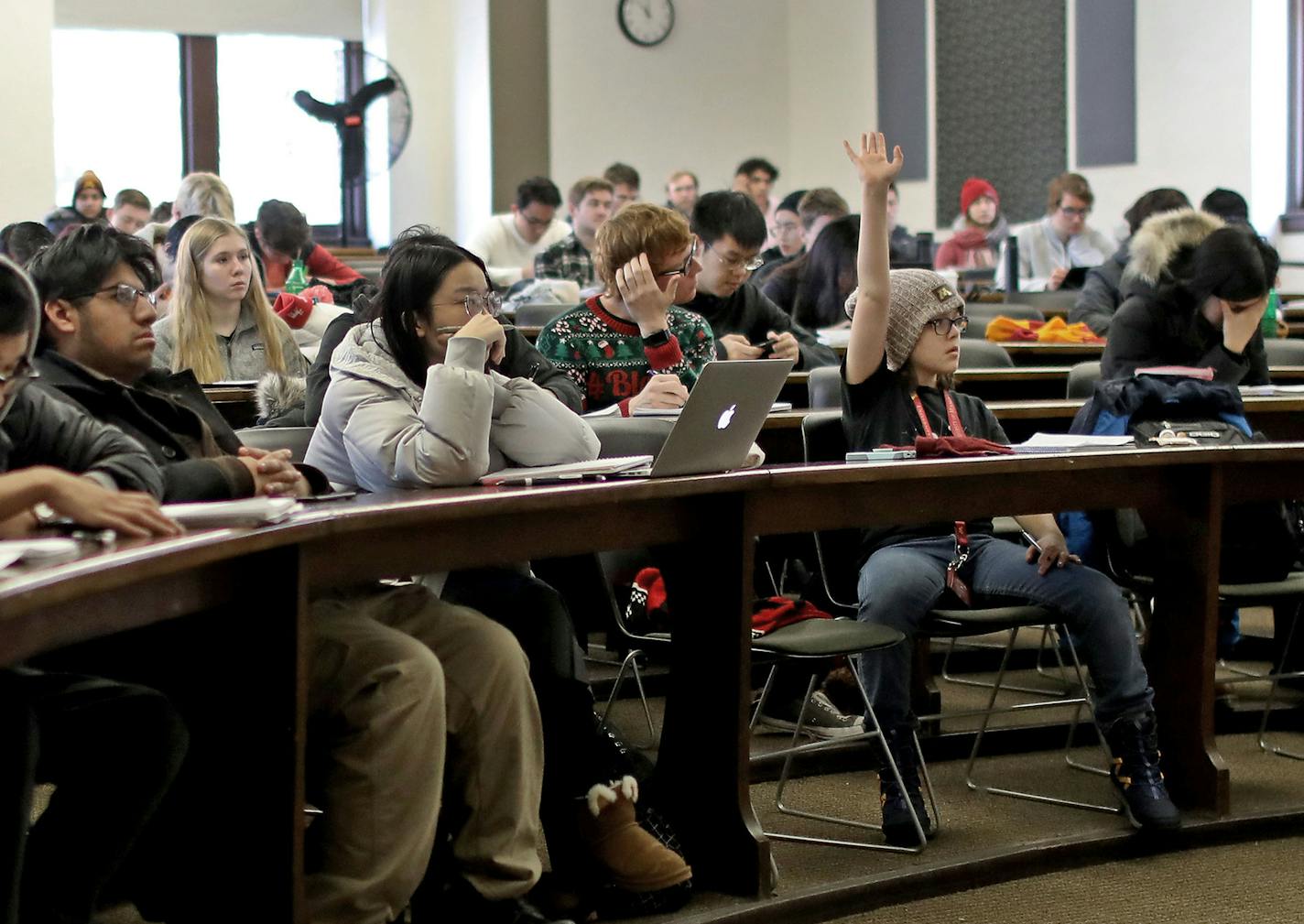 Eleven-year-old Elliott Tanner, a junior at the University of Minnesota, raises his hand to ask a question to his calculus 4 class Dec. 11.