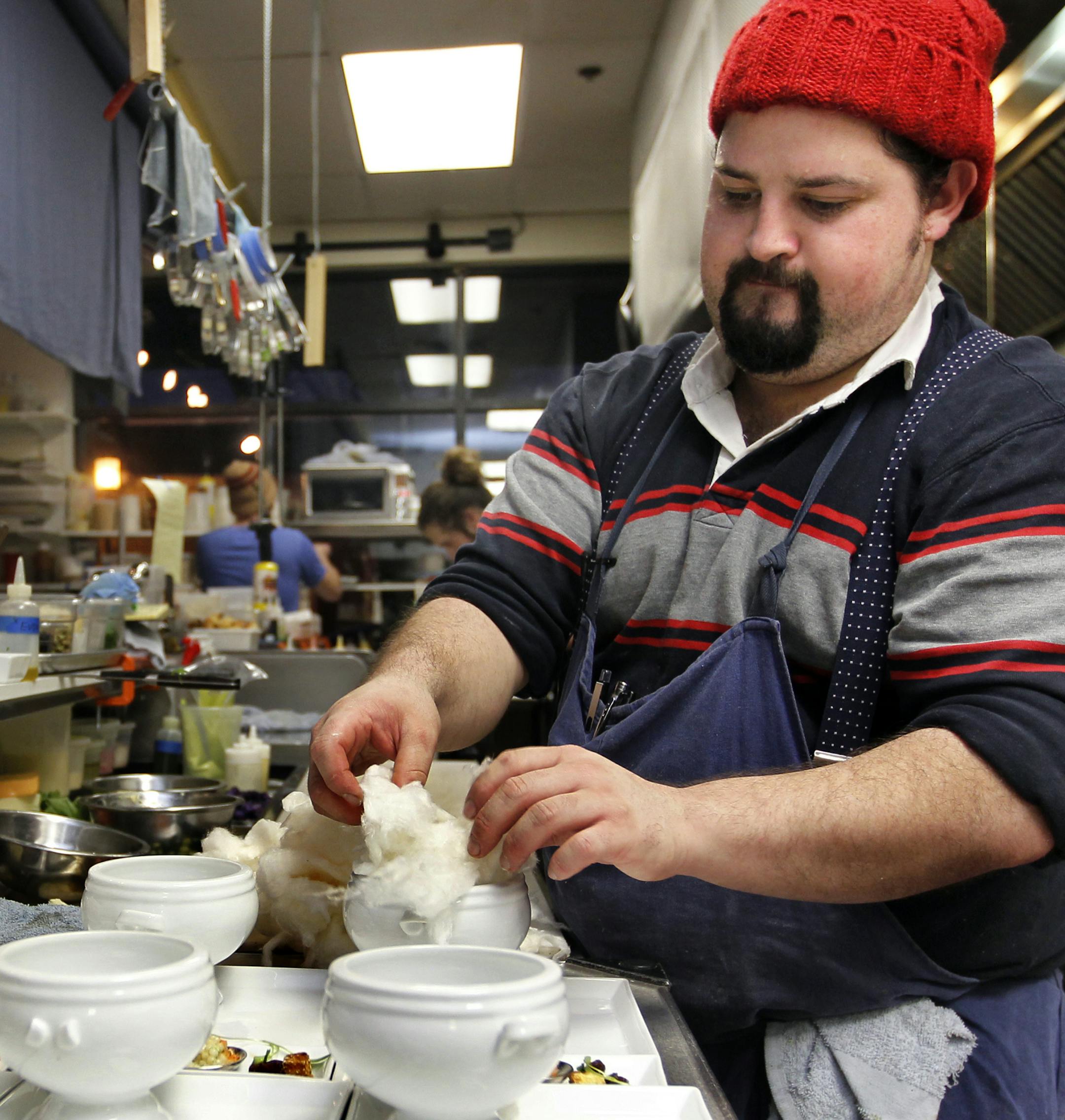 Chef, Mike Brown worked his station on a busy Wednesday night prepping the Cotton Candy Carrot soup. The Travail crew with owners, Bob Gerken, Mike Brown and James Winberg are part a new chef series we are starting in the taste section. [ TOM WALLACE ‚Ä¢ twallace@startribune.com _ Assignments # 20021974A_ February 15, 2011_ SLUG: Travail0223_ EXTRA INFORMATION: ORG XMIT: MIN2012121914144630