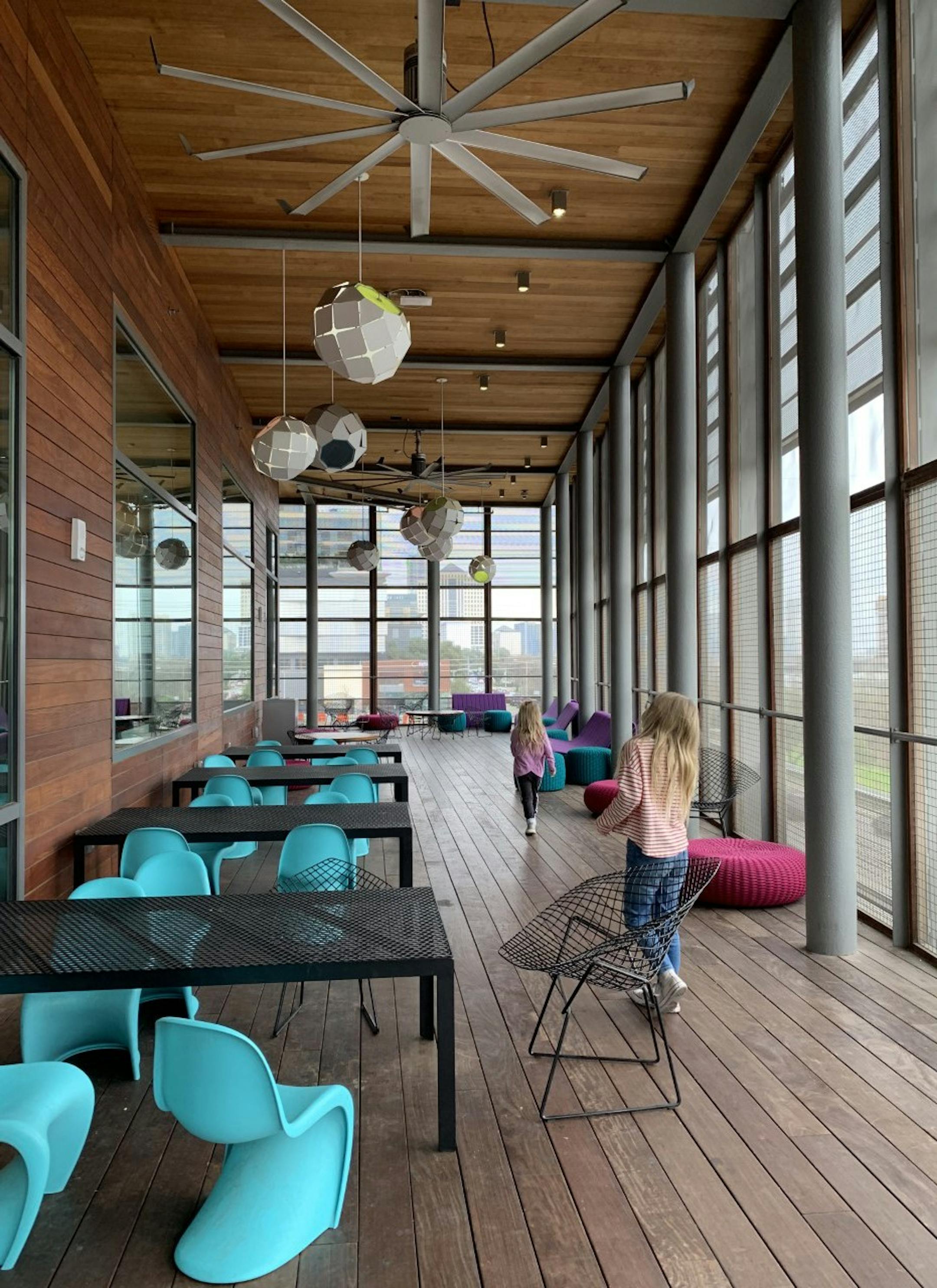 The new Austin Central Library's reading porch overlooks Lady Bird Lake and the city's dramatically expanding skyline. (Chris Riemenschneider/Star Tribune)