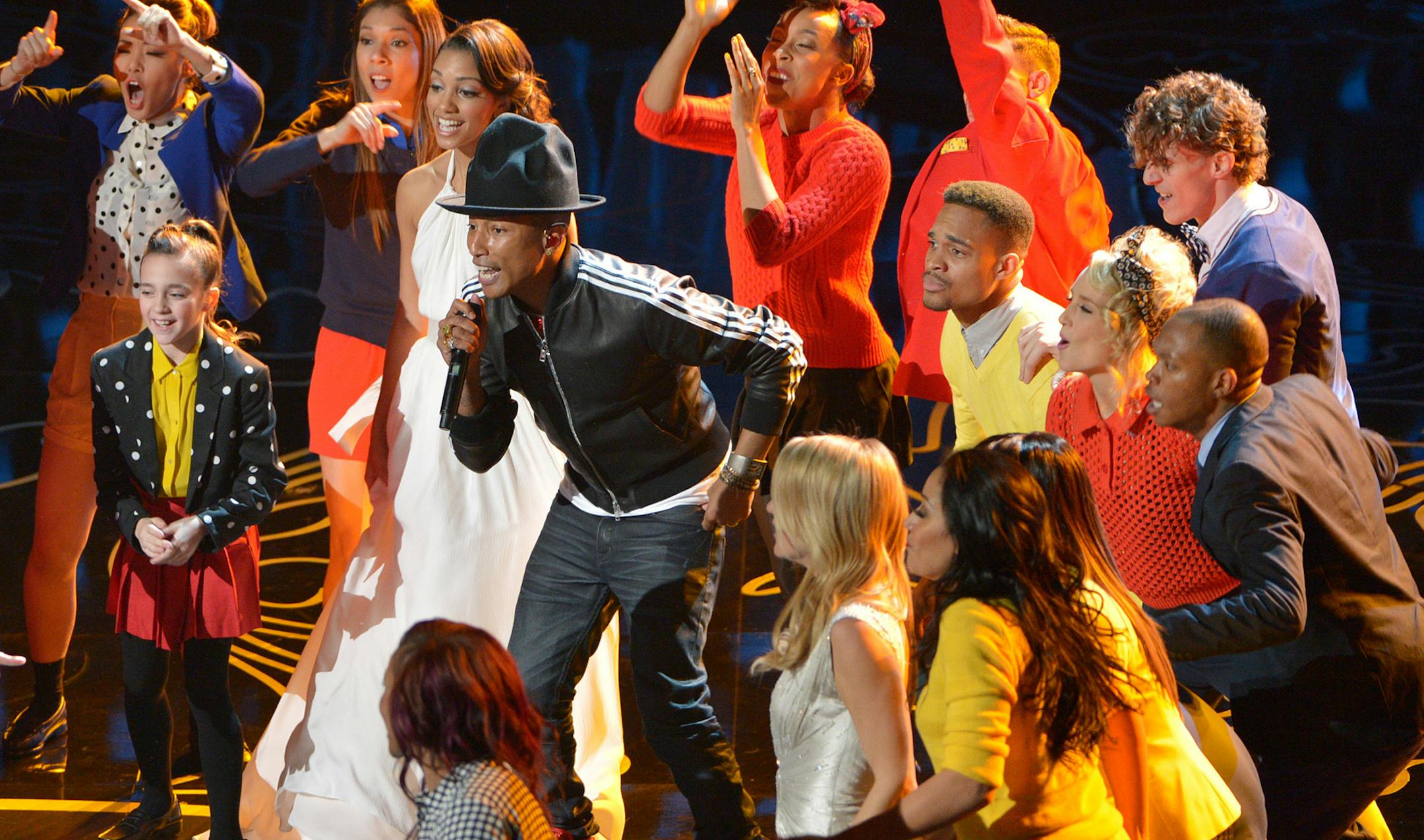 Pharrell Williams, center, performs "Happy" during the Oscars at the Dolby Theatre on Sunday, March 2, 2014, in Los Angeles. (Photo by John Shearer/Invision/AP)