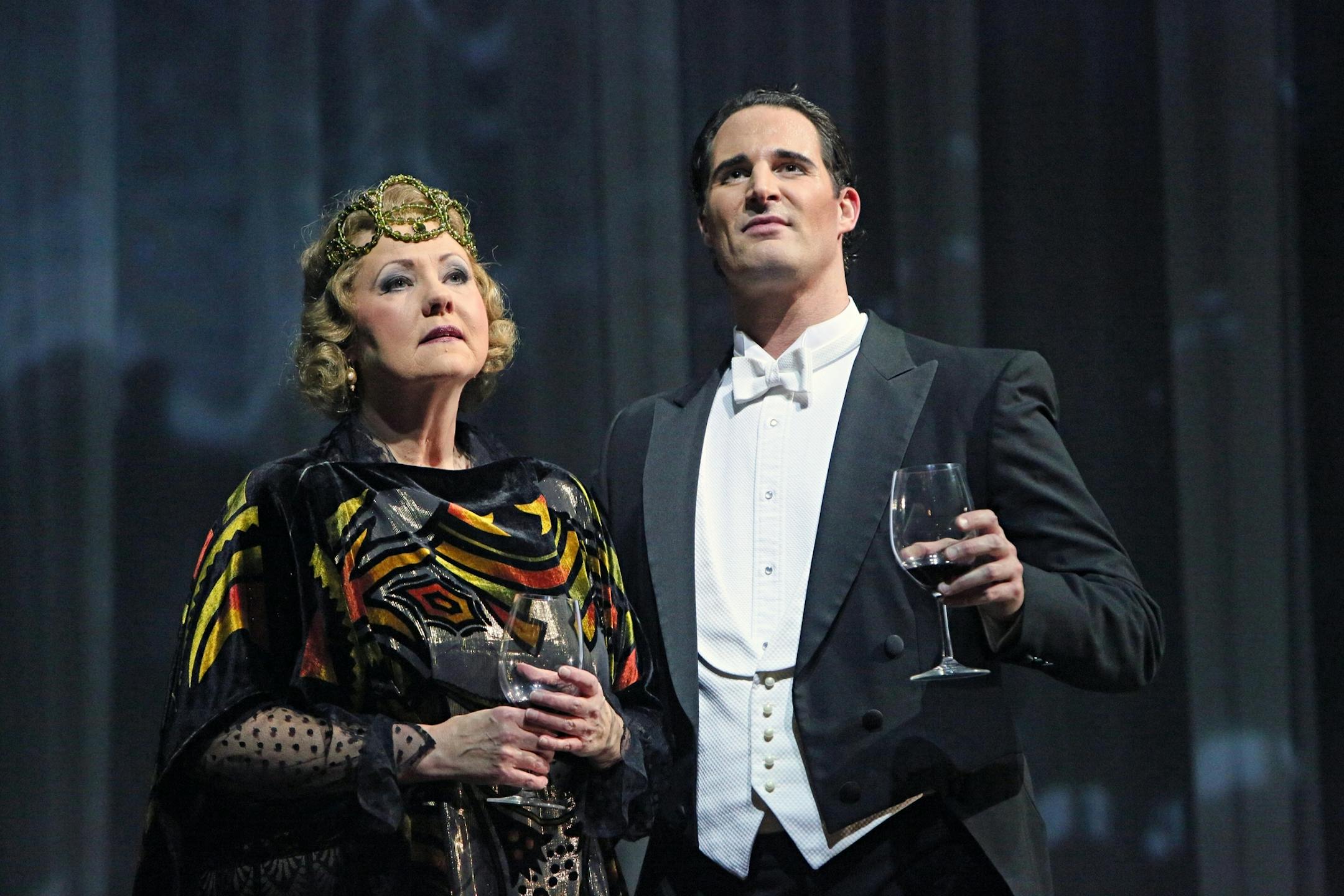 Photo by Michal Daniel June Mathis, a screenwriter - Brenda Harris and Rudolph Valentino - James Valenti in Minnesota Opera's production of The Dream of Valentino Music by Dominick Argento?Libretto by Charles Nolte World premiere at The Kennedy Center, Washington D.C. January 15, 1994 √ä Creative Team Conductor - Christoph Campestrini Stage Director - Eric Simonson Senic Designer - Erhard Rom Projections Designer - Peter Nigrini Costume Designer - Karin Kopischke Lighting Designer -