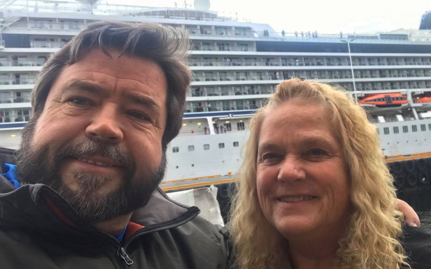 Rodney Horgen and Judy Lemieux, in their hotel room in Molde, Norway. That&#x2019;s the troubled ship they were on in the background.
Credit: By Rodney Horgen