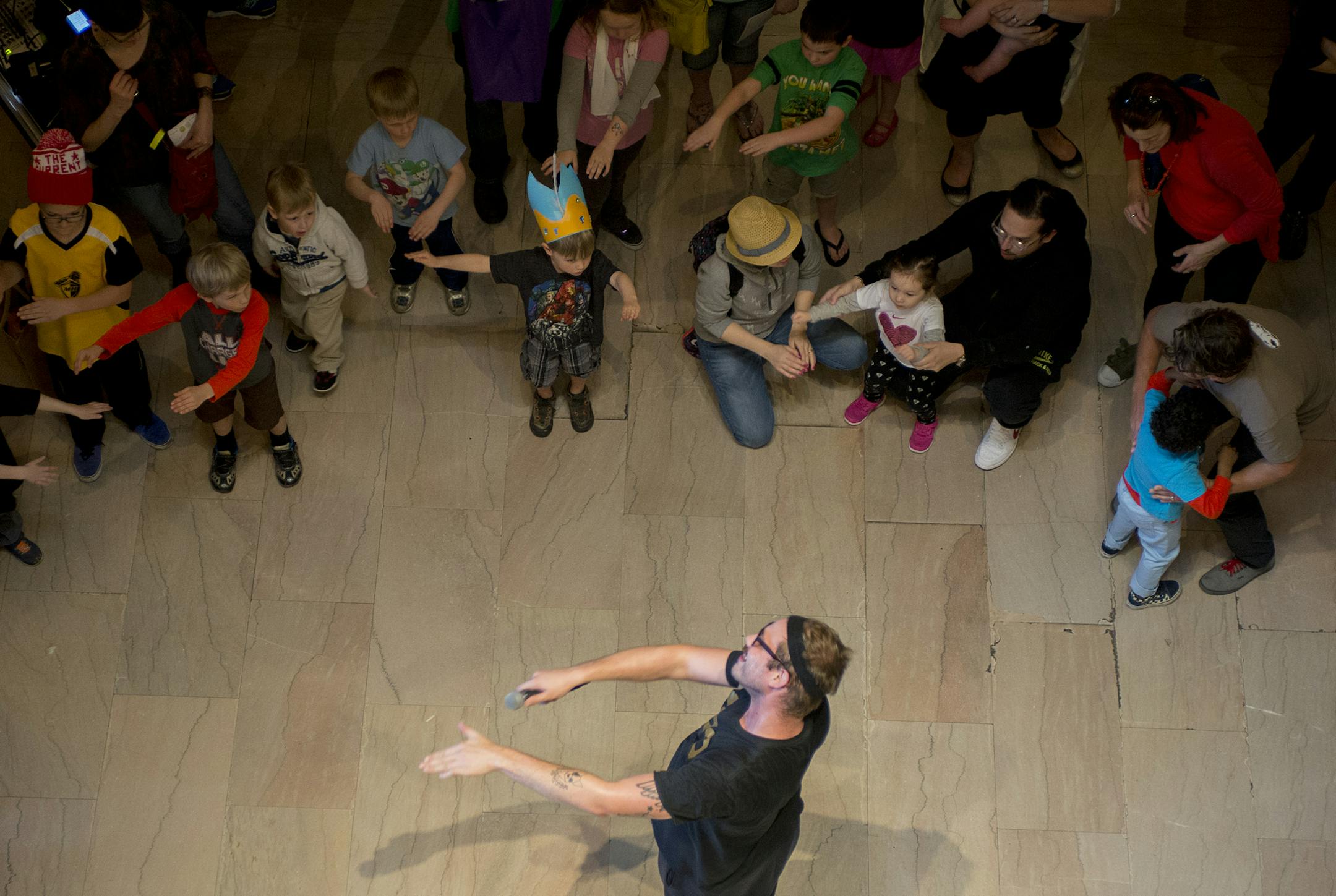 Koo Koo Kanga Roo perform as kids dance and sing along.] BRIDGET BENNETT SPECIAL TO THE STAR TRIBUNE • bridget.bennett@startibune.com 89.3 the Current's annual event Rock the Cradle at the Minneapolis Institute of Arts on Sunday, April 12, 2015. The event had storytelling by the radio's djs, arts and craft activities, and live performances form kids-music performers like Koo Koo Kanga Roo and the Okee Dokees.