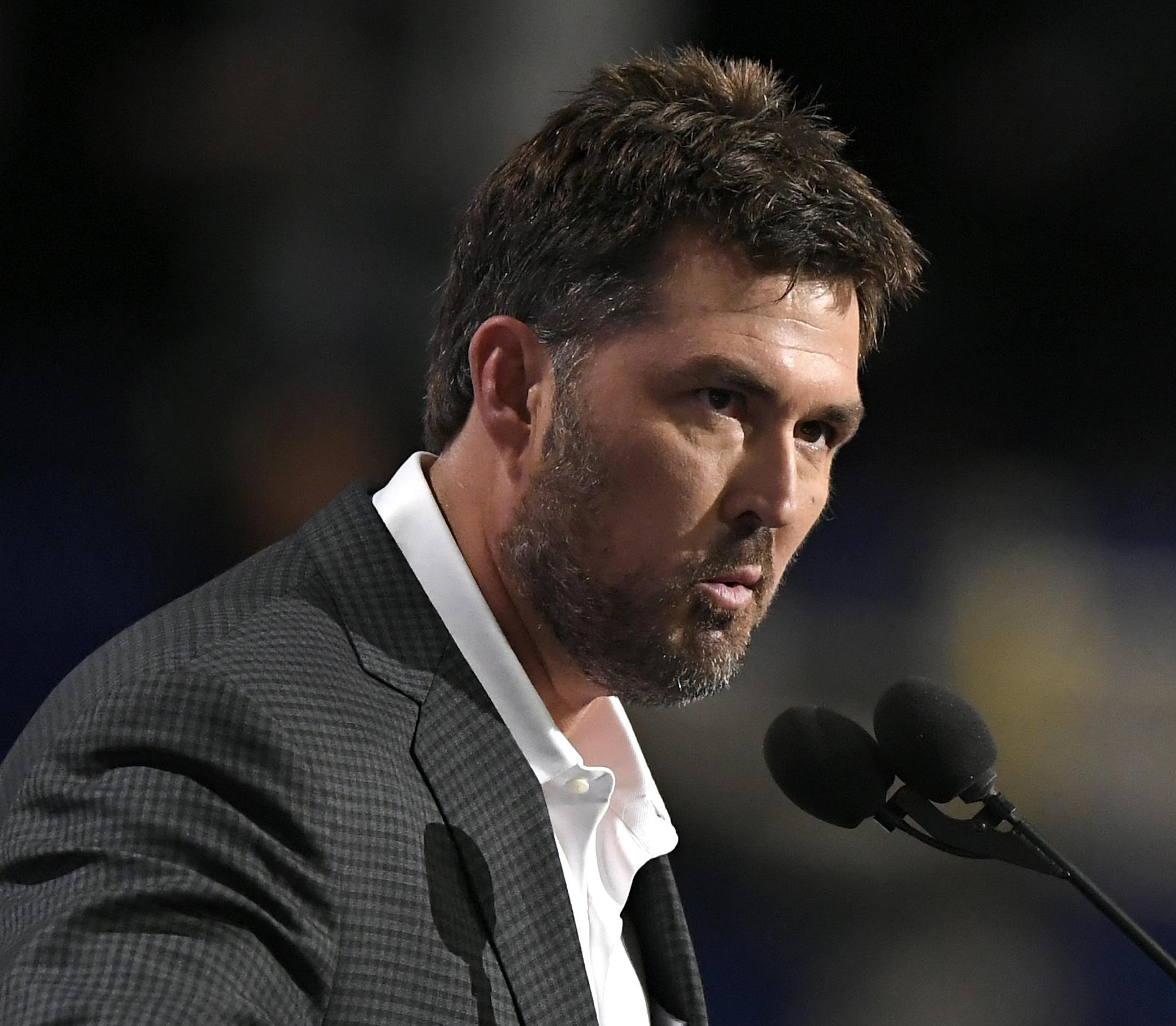 Retired U.S. Navy Seal Marcus Luttrell addresses delegates during the opening day of the Republican National Convention in Cleveland, Monday, July 18, 2016. (AP Photo/Mark J. Terrill)